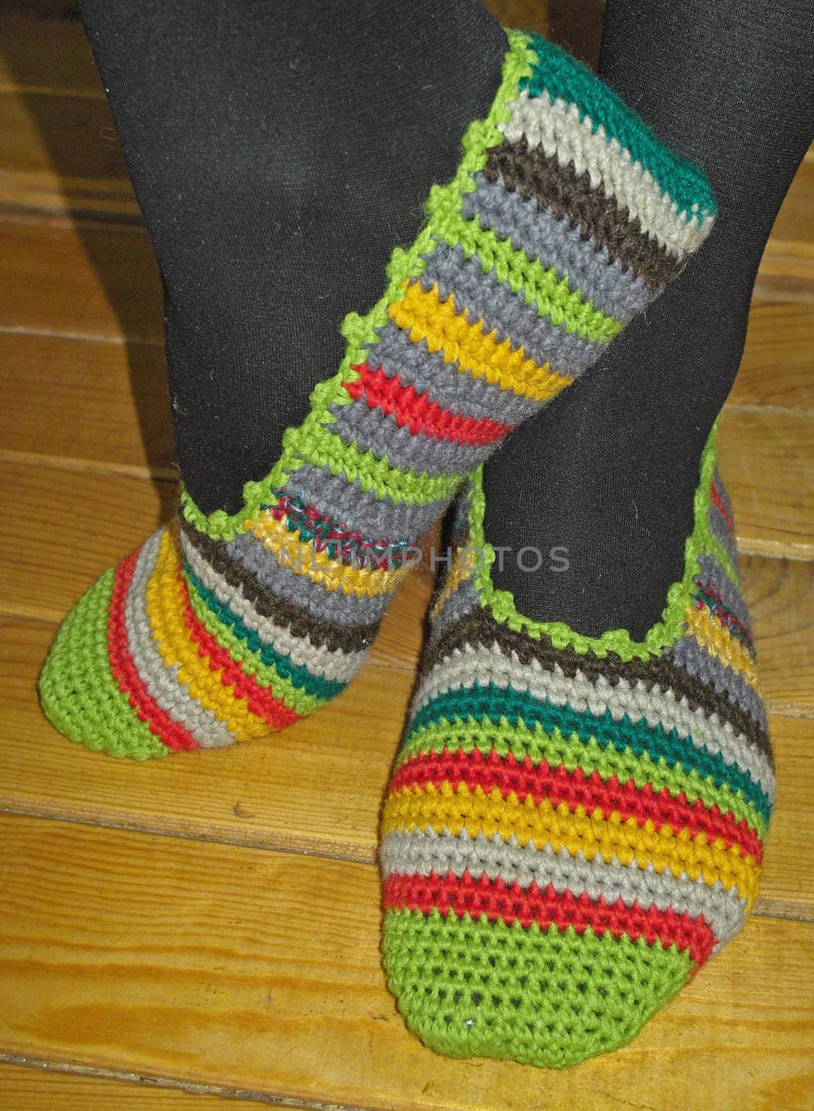 Hand knitted female slippers by sattva