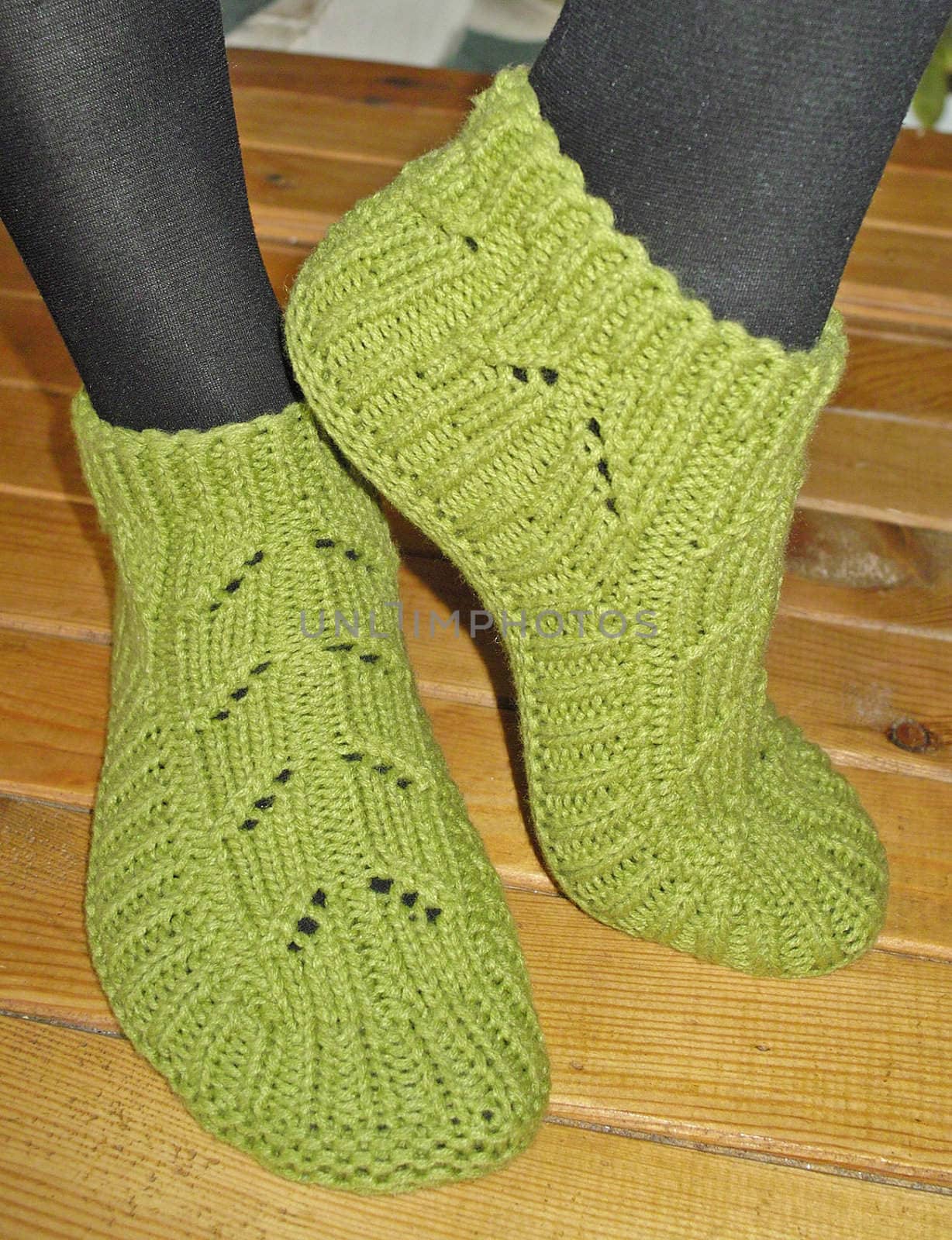 Hand knitted female slippers by sattva