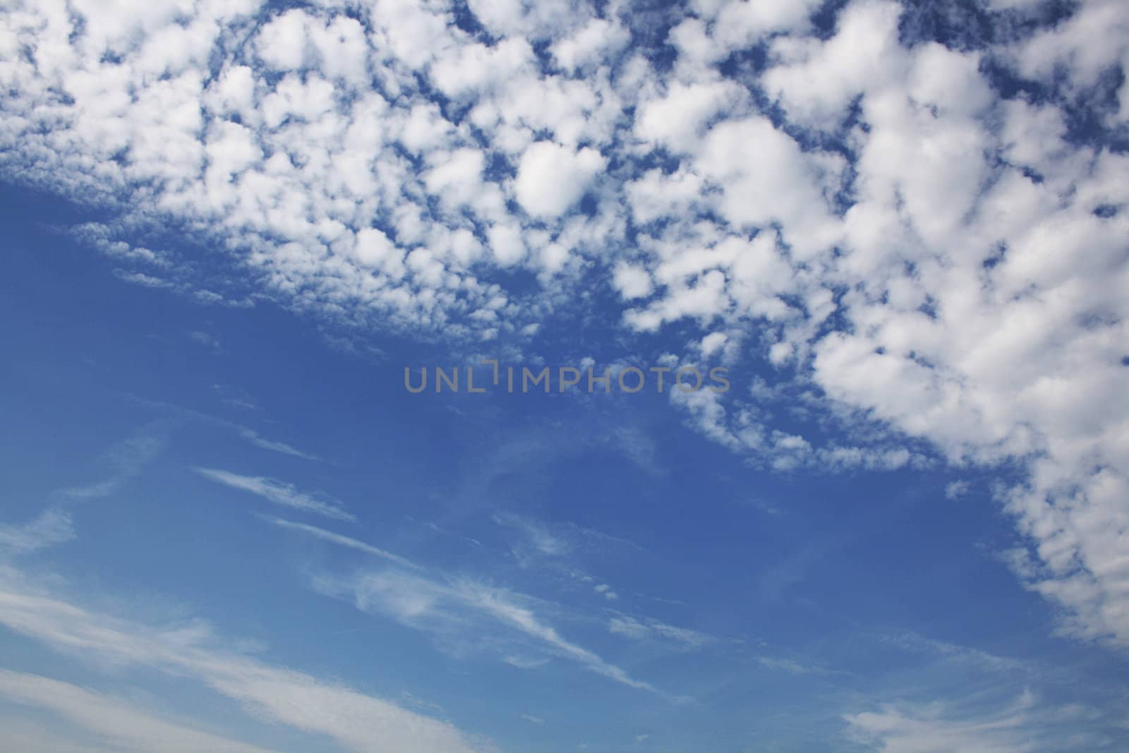 white clouds on blue sky