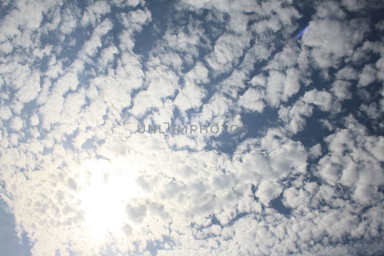 white clouds on blue sky