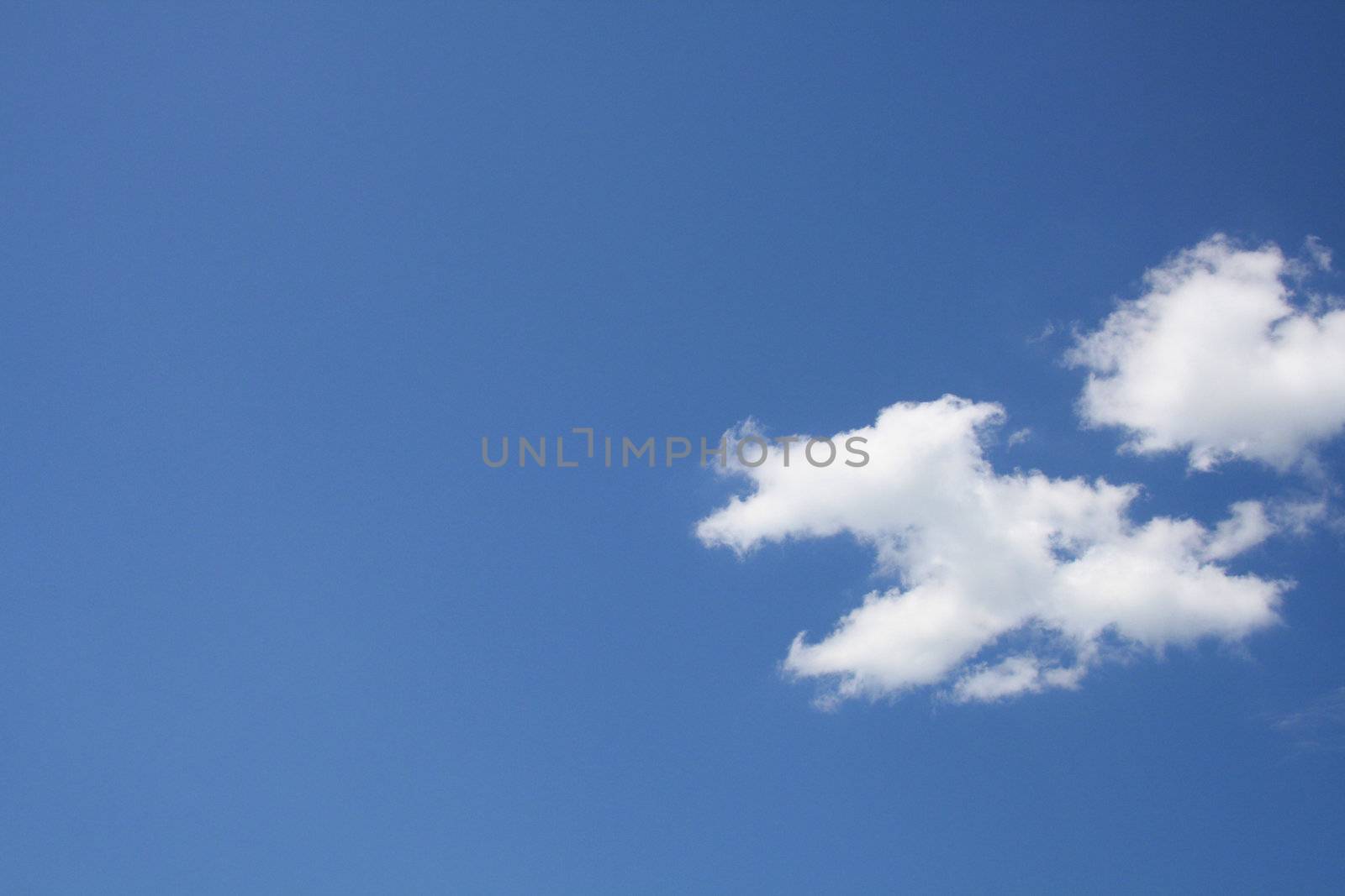 white clouds on blue sky