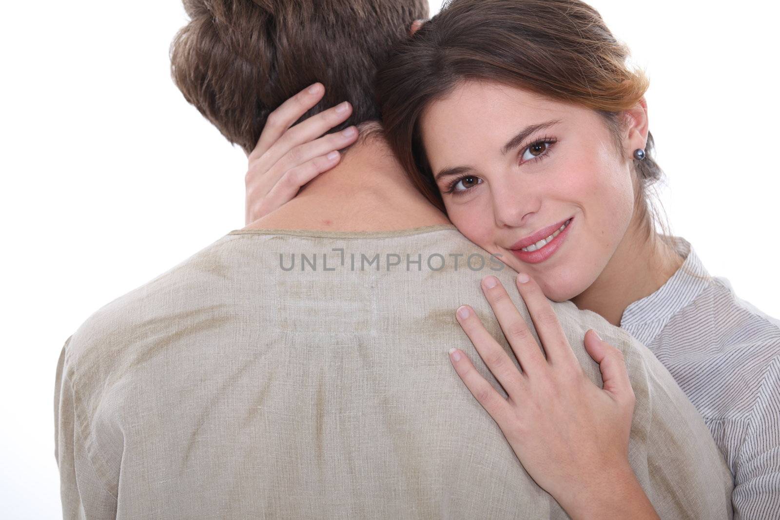 Studio shot of a couple hugging by phovoir