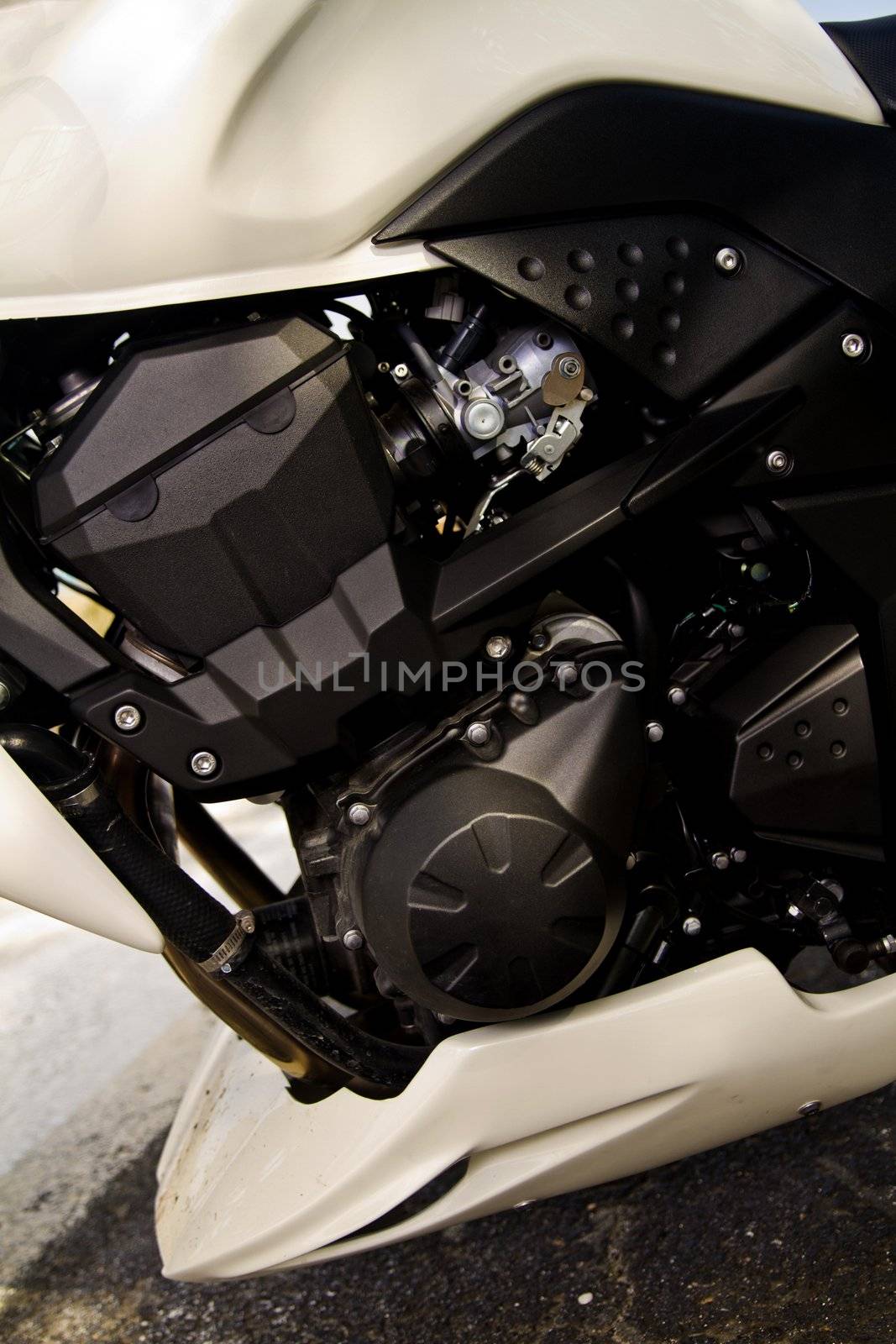View of a high speed motorcycle detail of the engine.