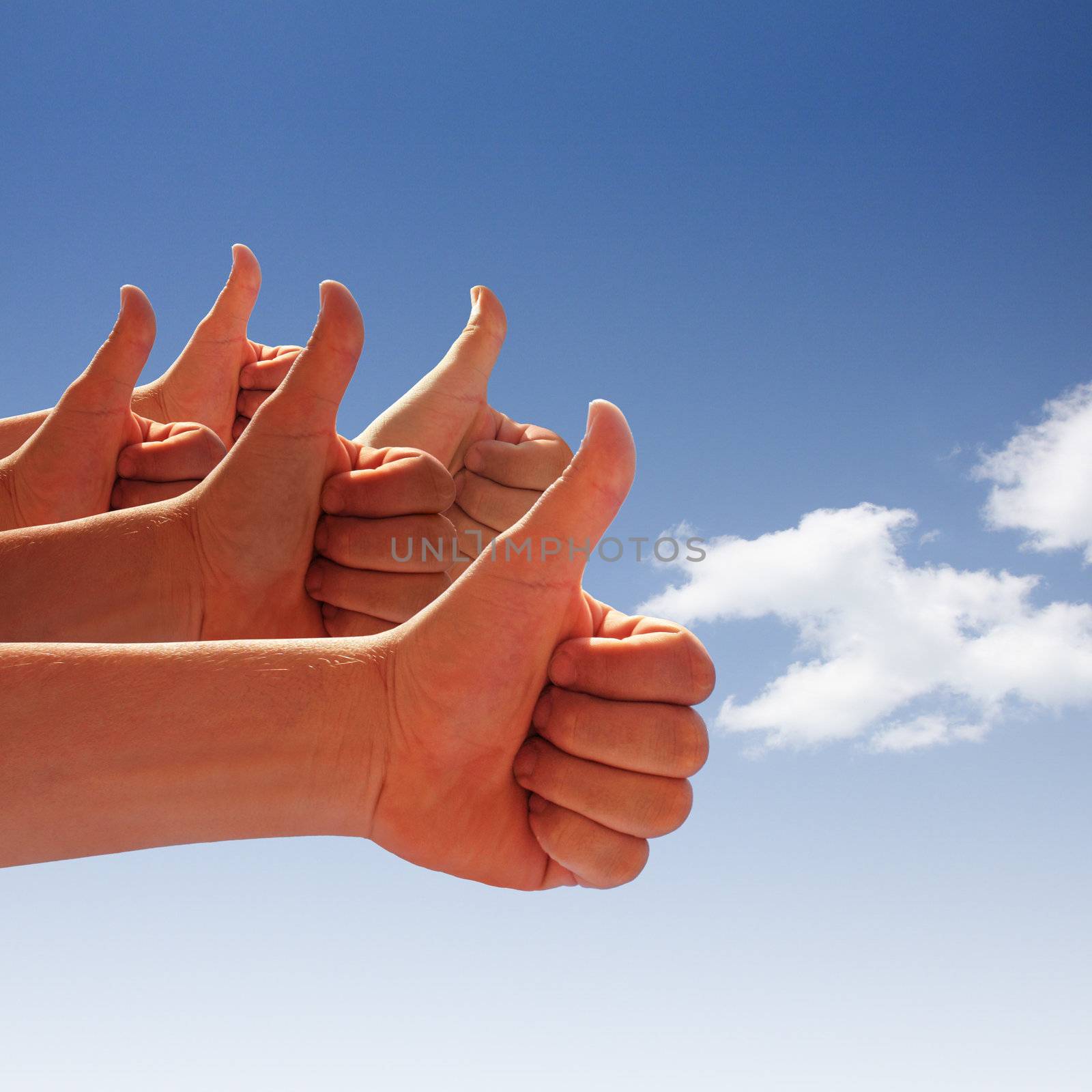 men's hands make thumbs up on blue sky