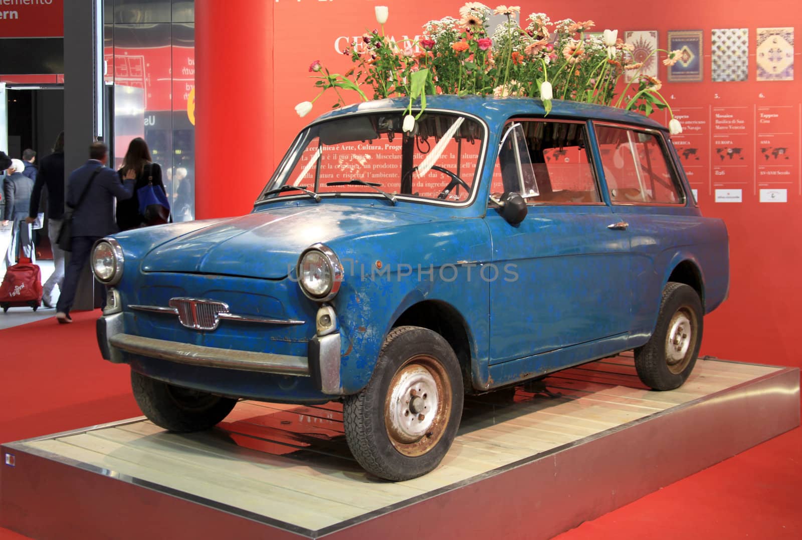 Vintage Fiat Bianchina installation at Salone Internazionale del Mobile - International home furnishing and accessories exhibition