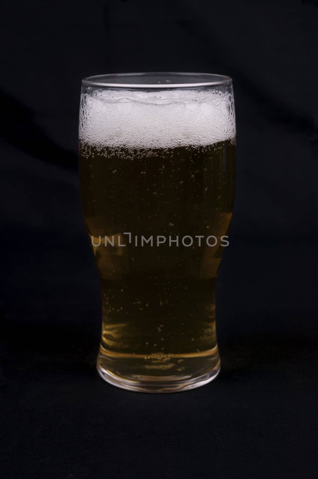 Beer Glass  isolated on a  black  background