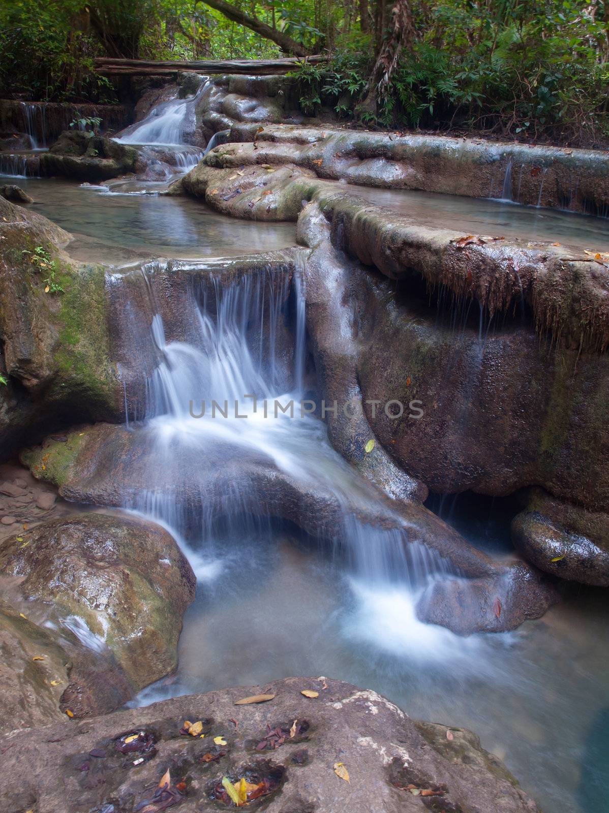 Emerald color water in tier fifth of Erawan waterfall, Erawan National Park, Kanchanaburi, Thailand