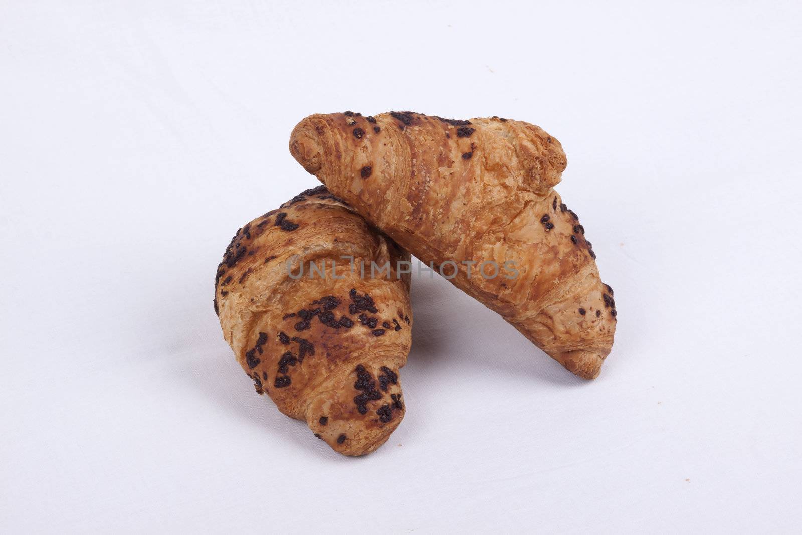 fresh chocolate croissant isolated on a white  background