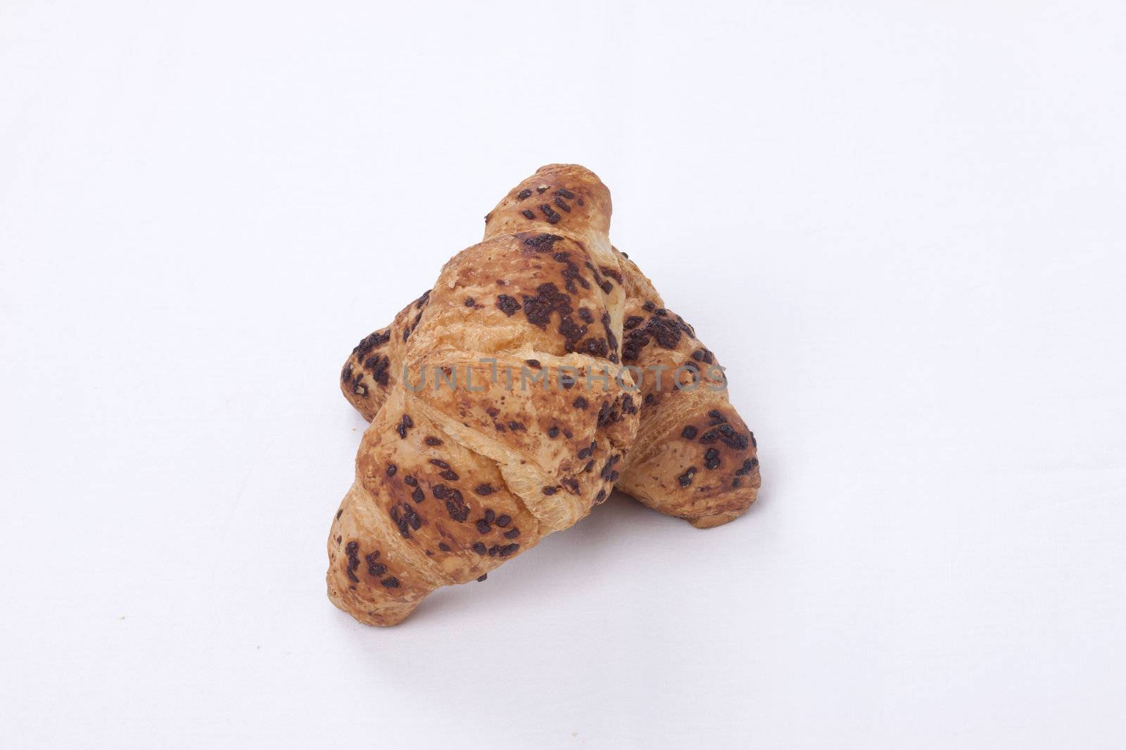 fresh chocolate croissant isolated on a white  background