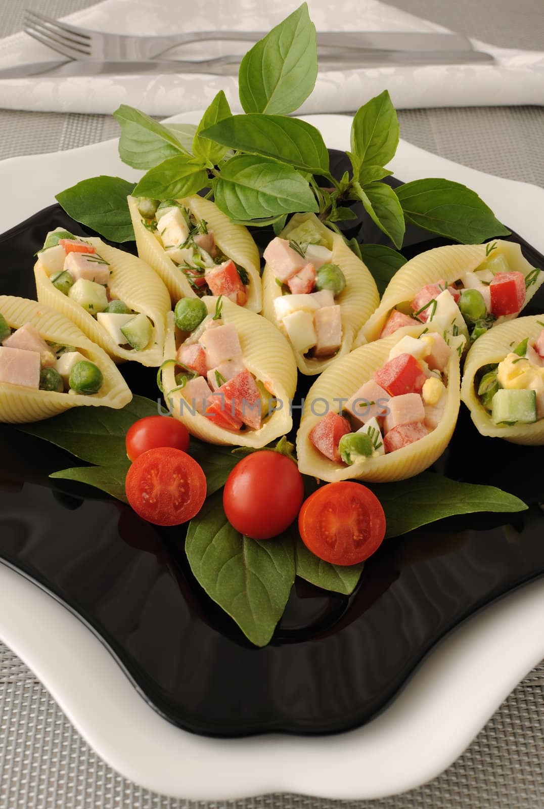 Sea shells pasta stuffed with vegetables and ham by Apolonia