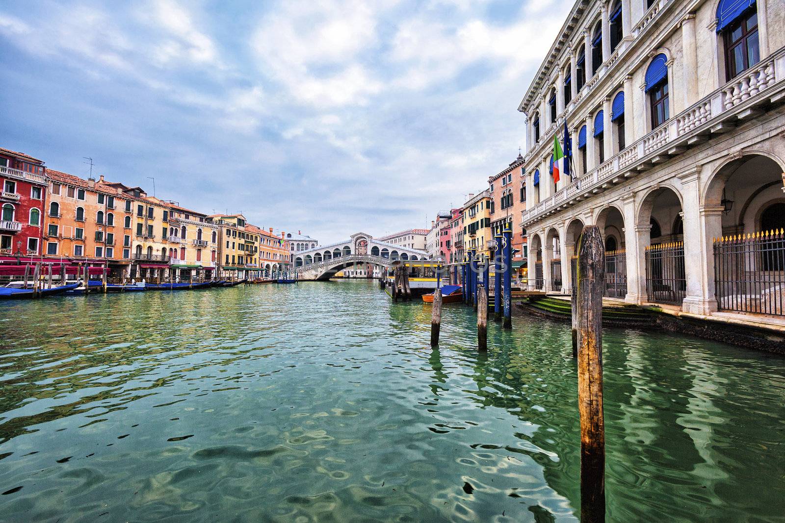 View of Venice with Rialto bridge on Grand Canal, Italy