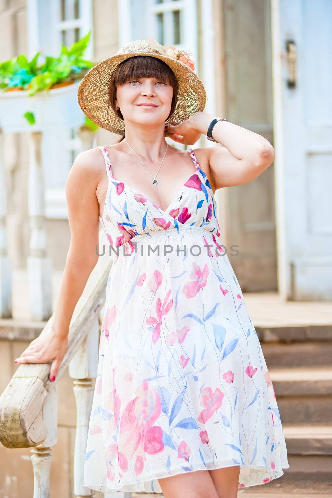 Young slim girl on the front stairs of the old mansion. by kosmsos111