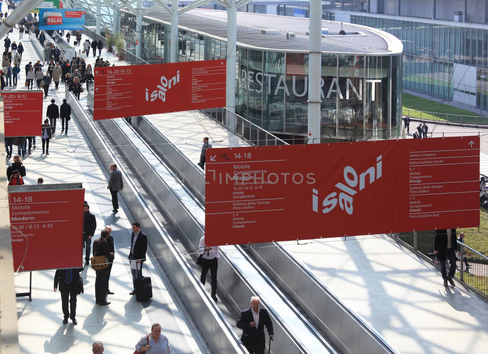 People enter Salone Internazionale del Mobile - International home furnishing and accessories exhibition