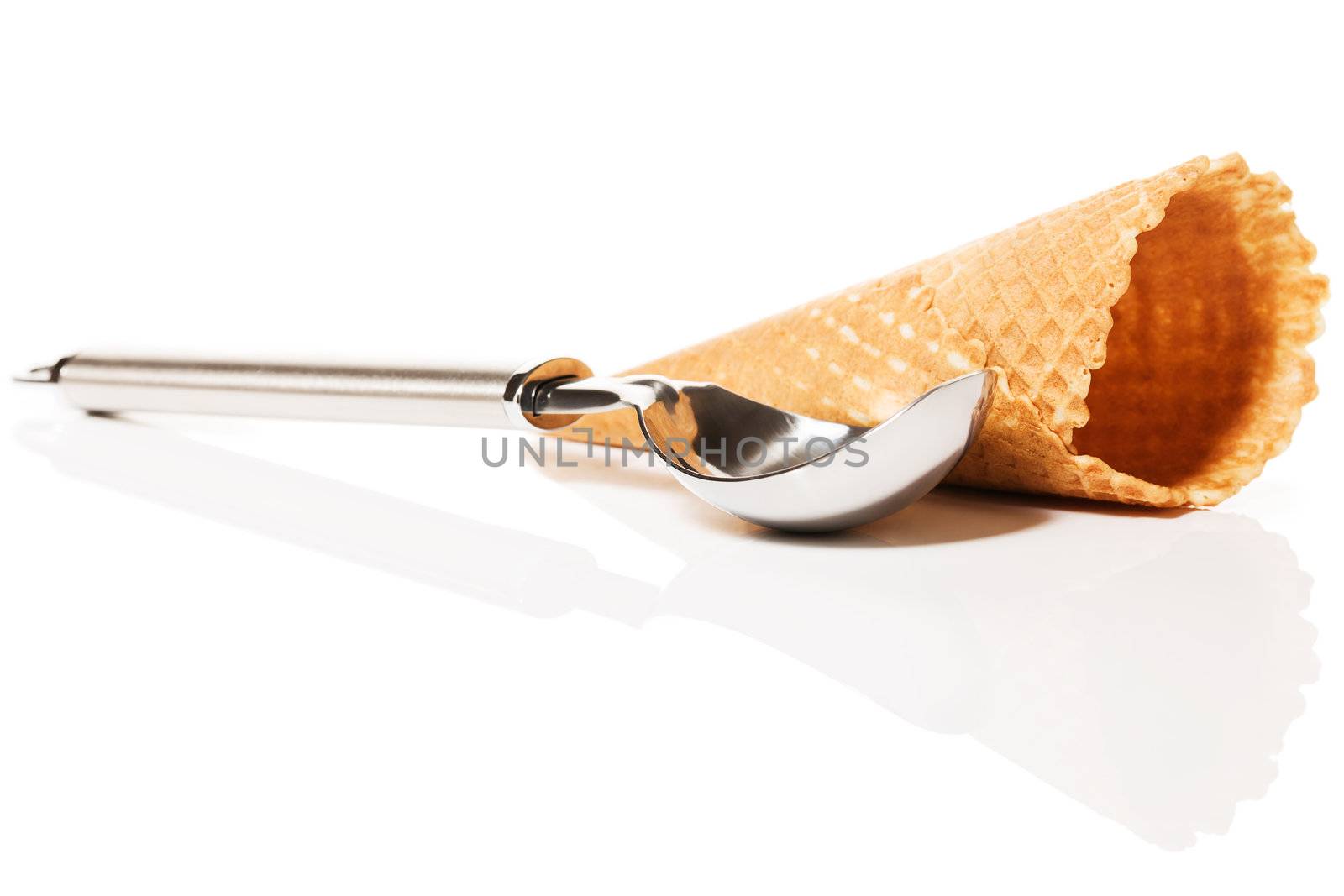 silver simple ice cream scoop with a ice cream waffle cone on white background