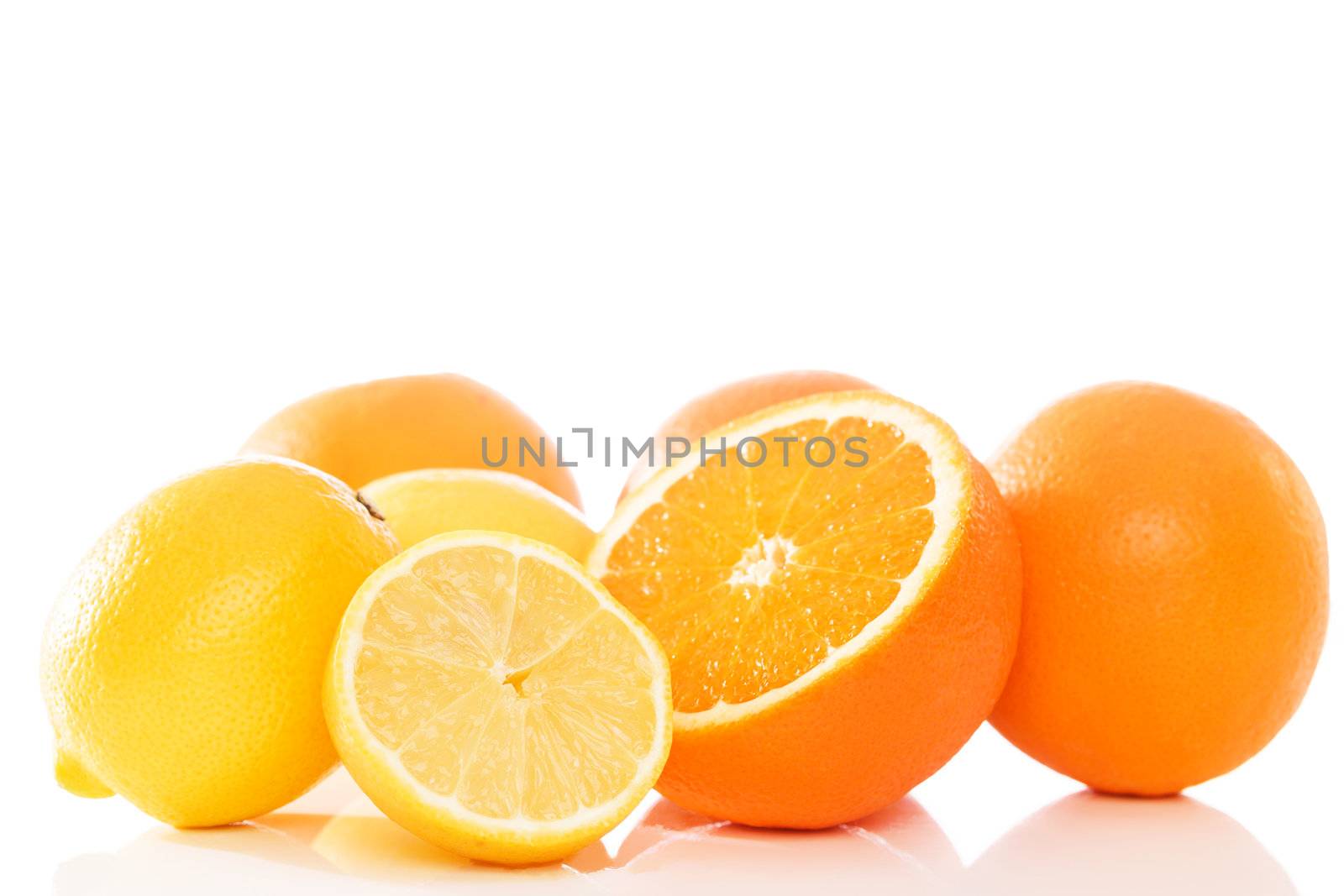 oranges and lemons on white background