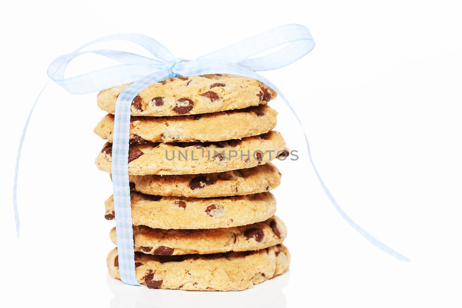 stacked cookies with a blue bow on white background