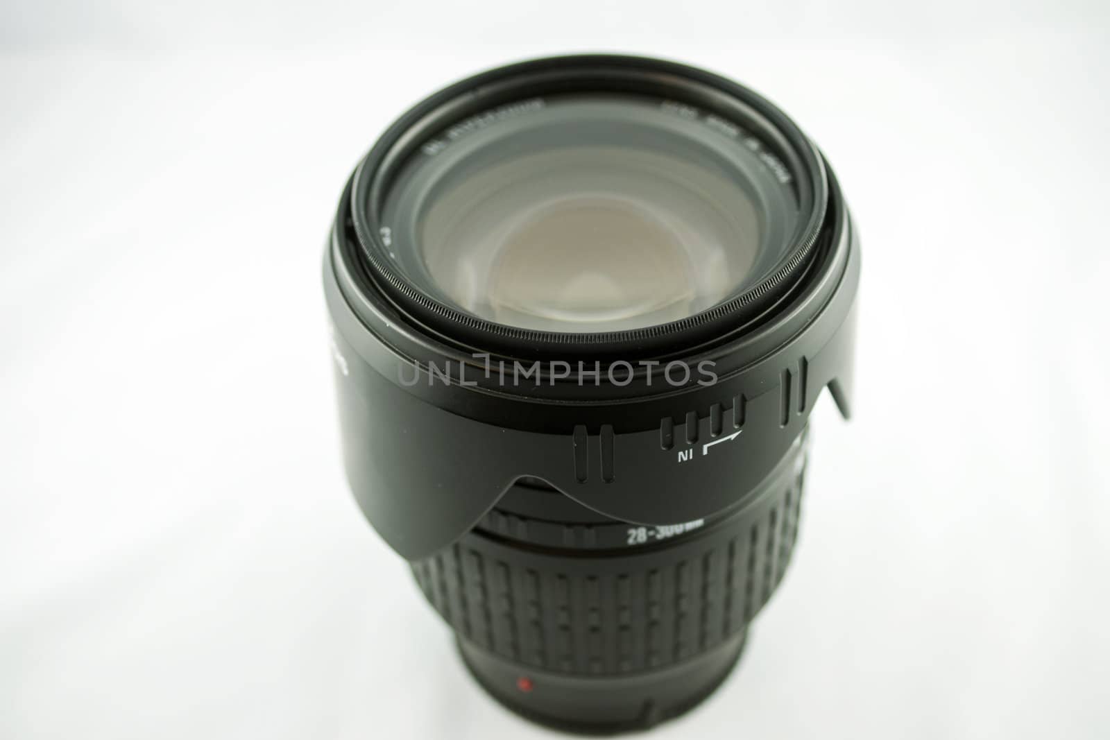 Lens with reflective gray and white background