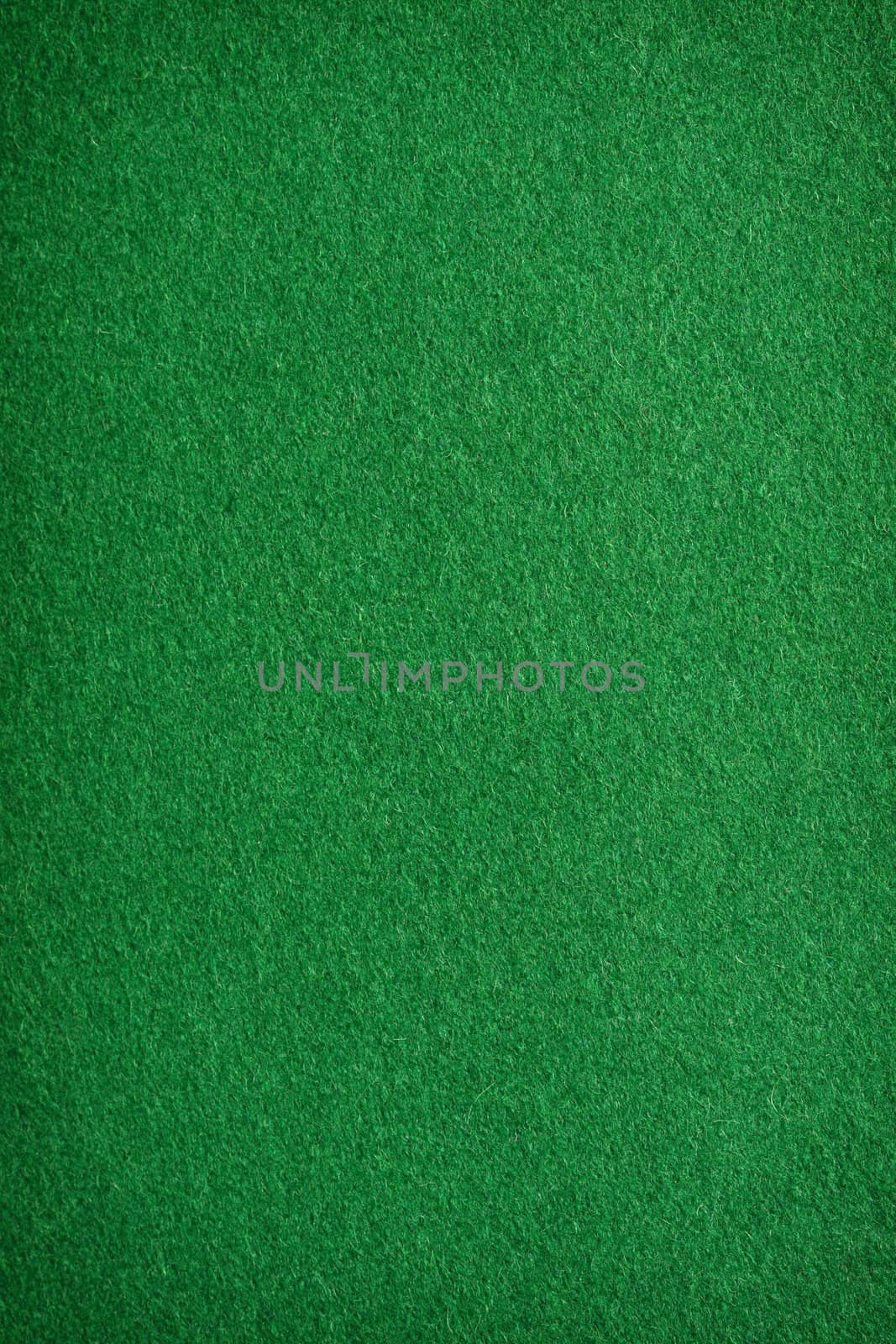 Green felt background. Useful for poker table or pool table surface