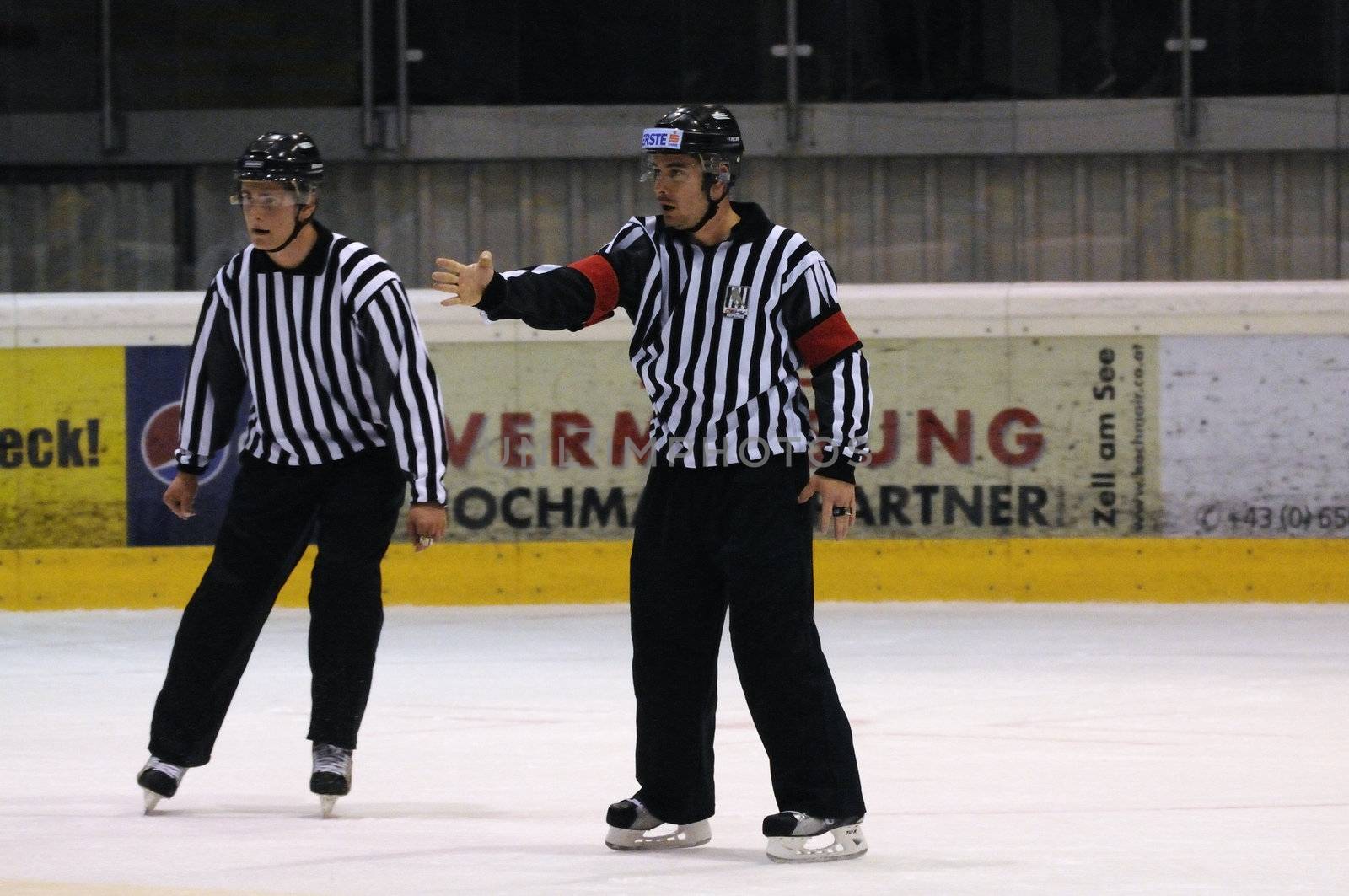 ZELL AM SEE; AUSTRIA - SEPT 24: Austrian National League. The referee gives a penalty to player. Game EK Zell am See vs EHC Lustenau (Result 1-8) on September 24, 2011 in Zell am See.