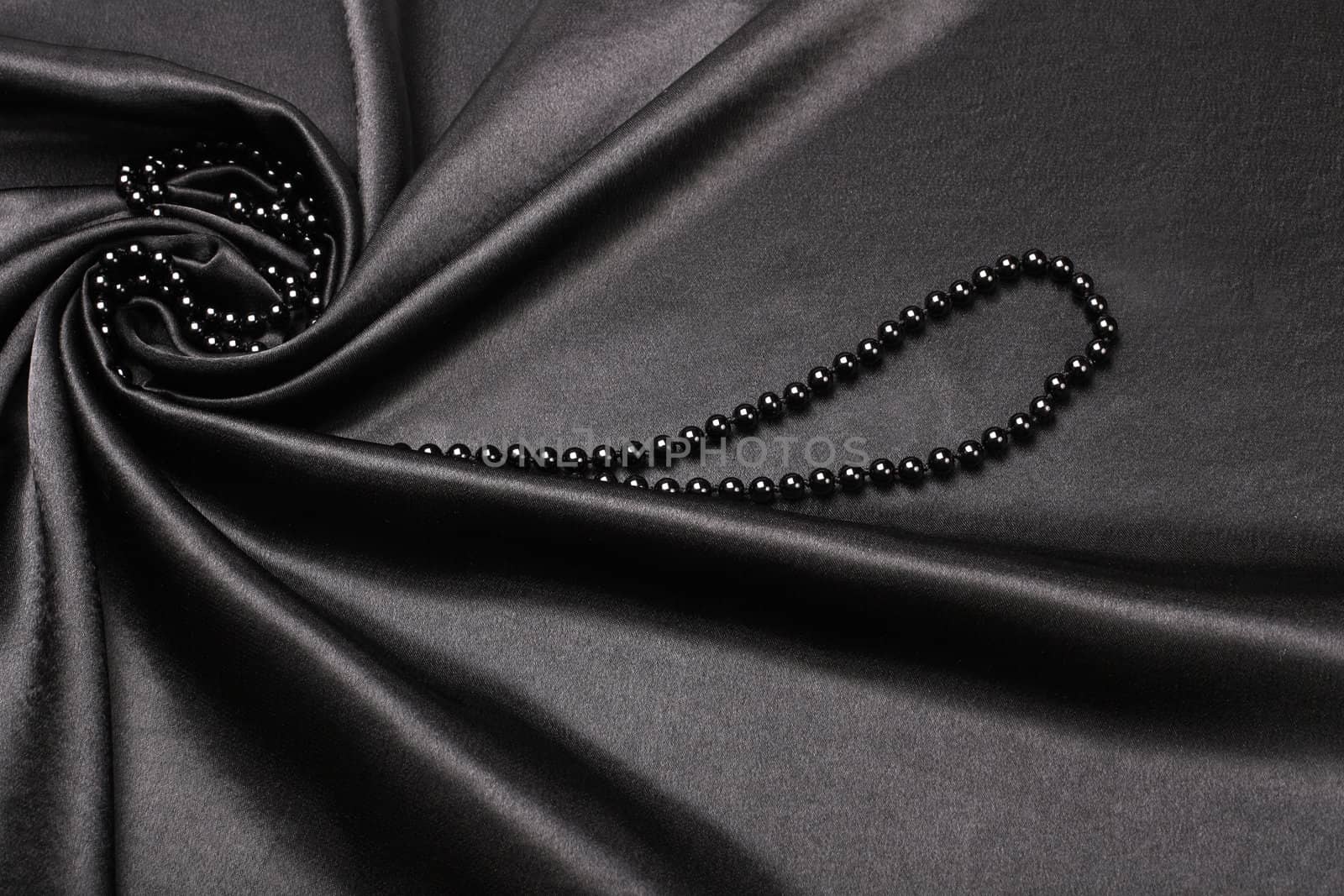 black silk fabric background by rudchenko