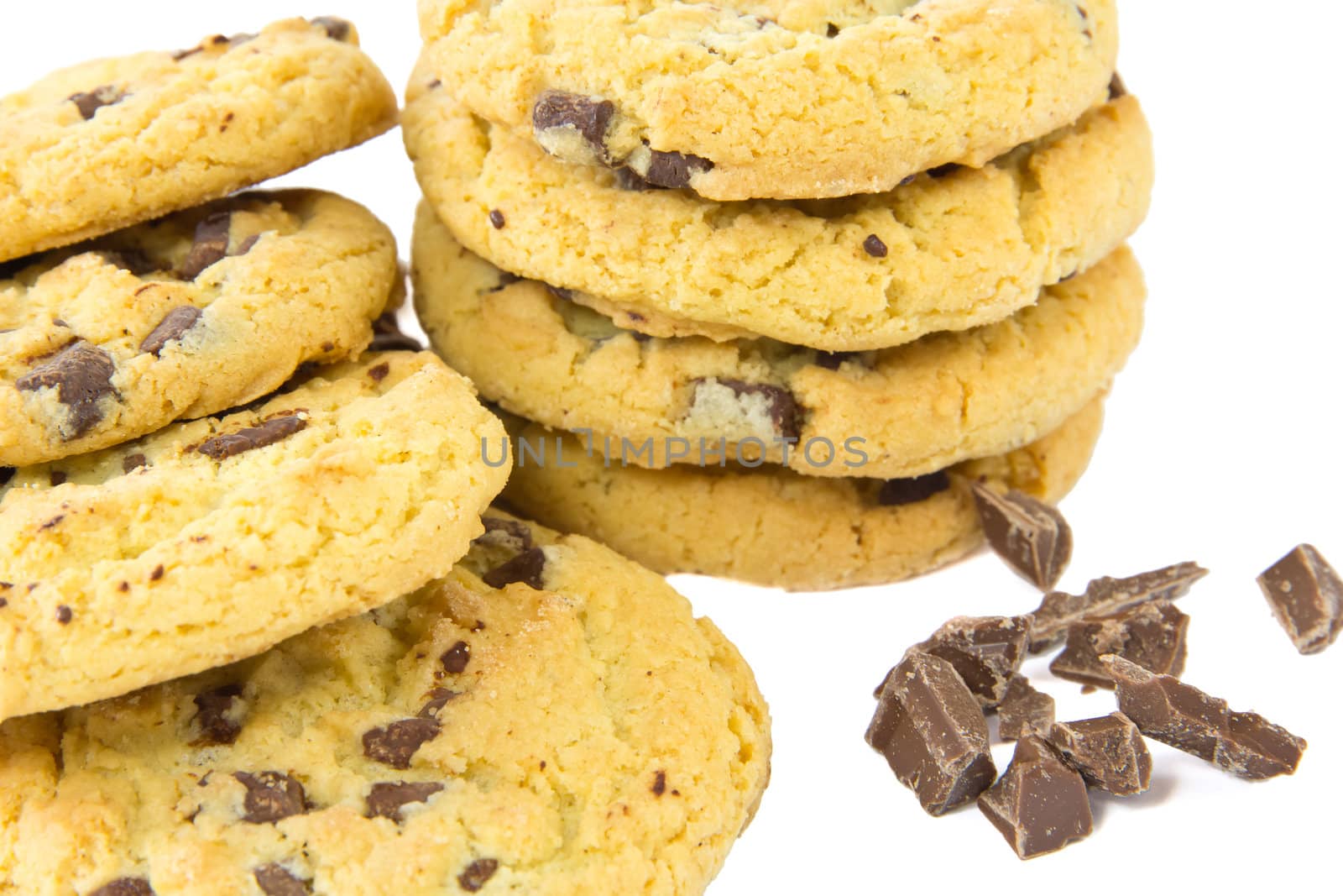 A picture of two stacks of some chocolate cookies with some chocolate