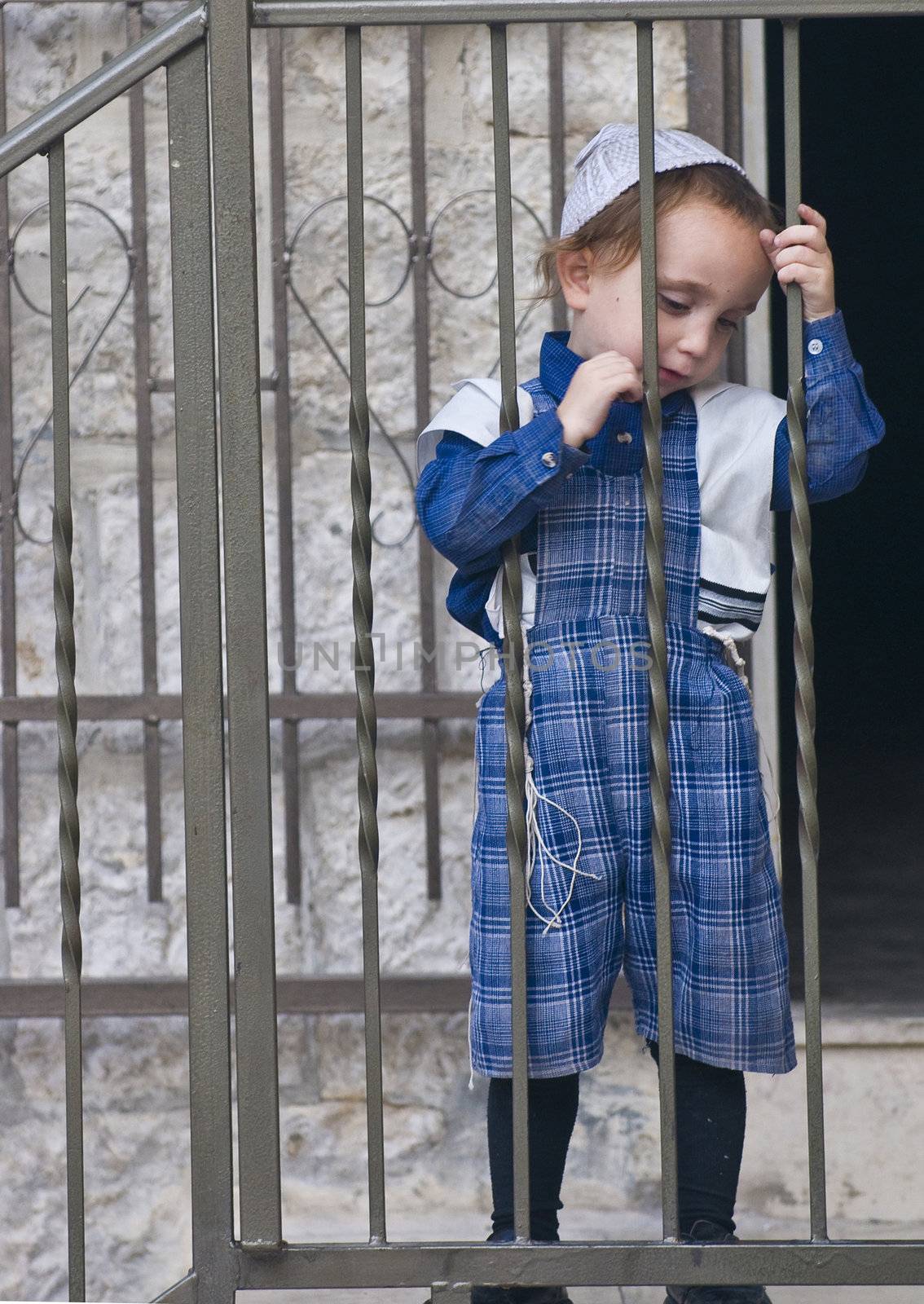 JERUSALEM - OCTOBER 10 2011 : Jewish ultra orthodox child in the " Mea Shearim" neighborhood in Jerusalem Israel.