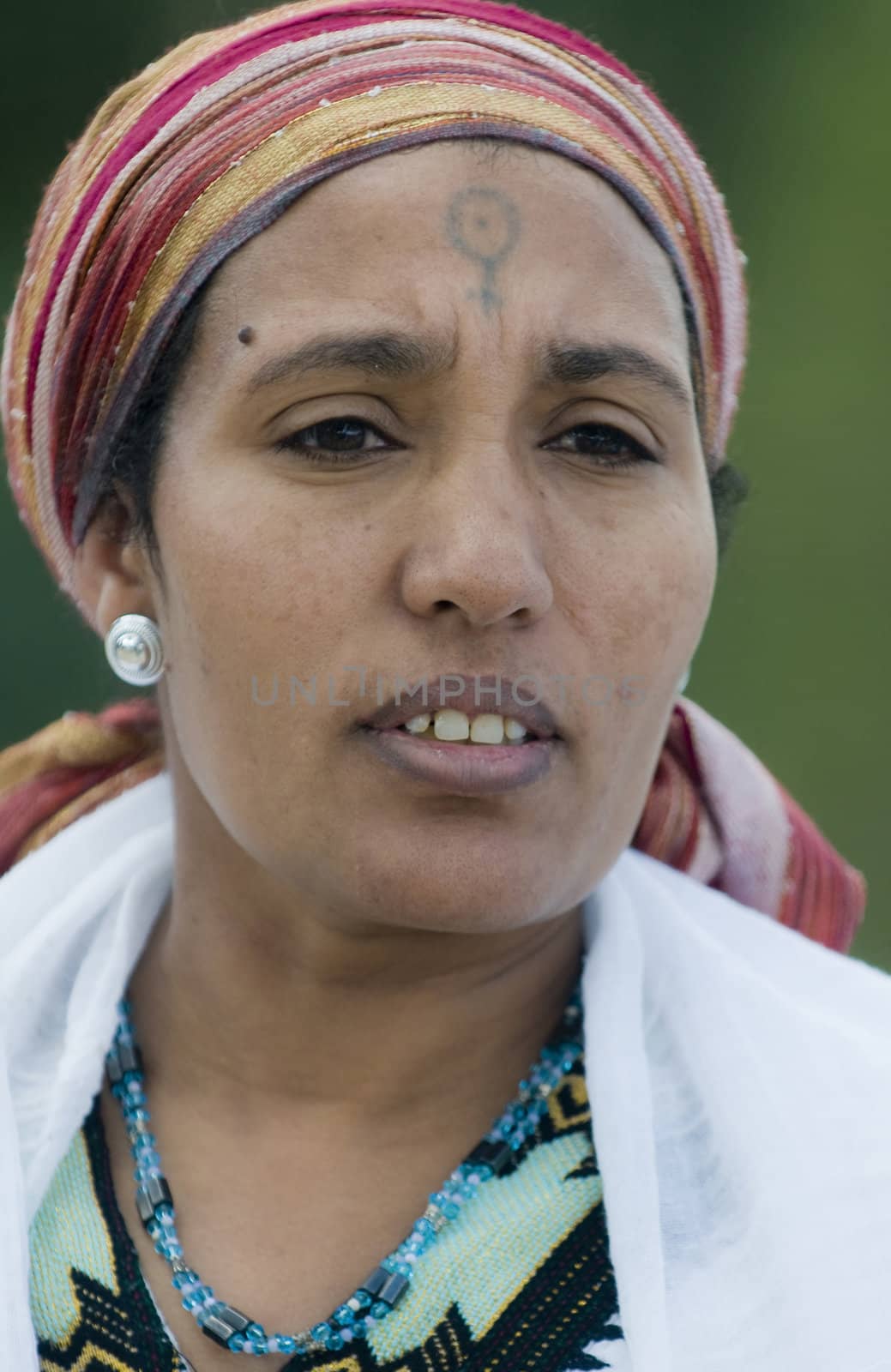 JERUSALEM - NOV 24 : Portrait of Ethiopian Jew woman during the Sigd holiday in Jerusalem . Israel on November 24 2011 , The Jewish Ethiopean community celebrates the Sigd annualy in Jerusalem