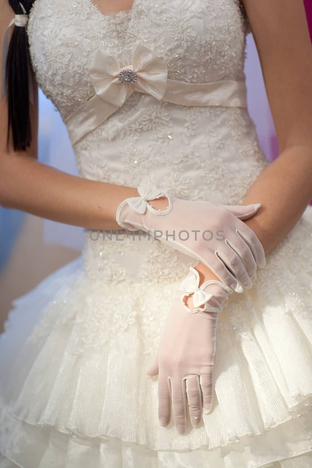 white dress and gloves on the girl