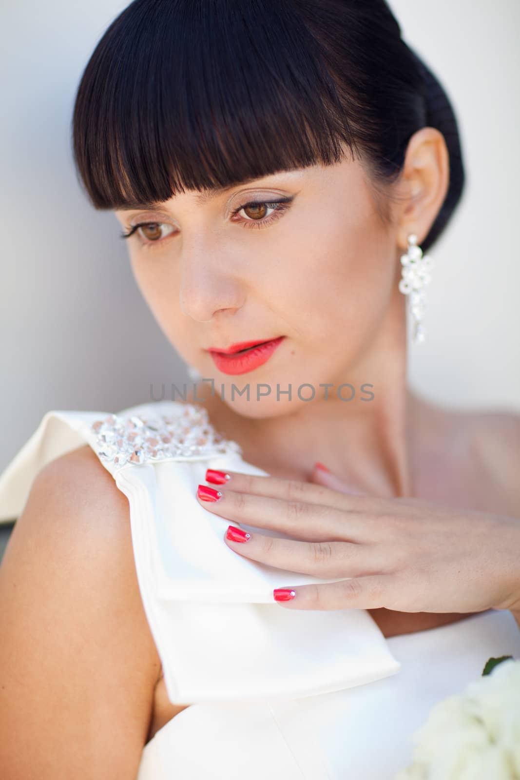 pretty bride near the wall