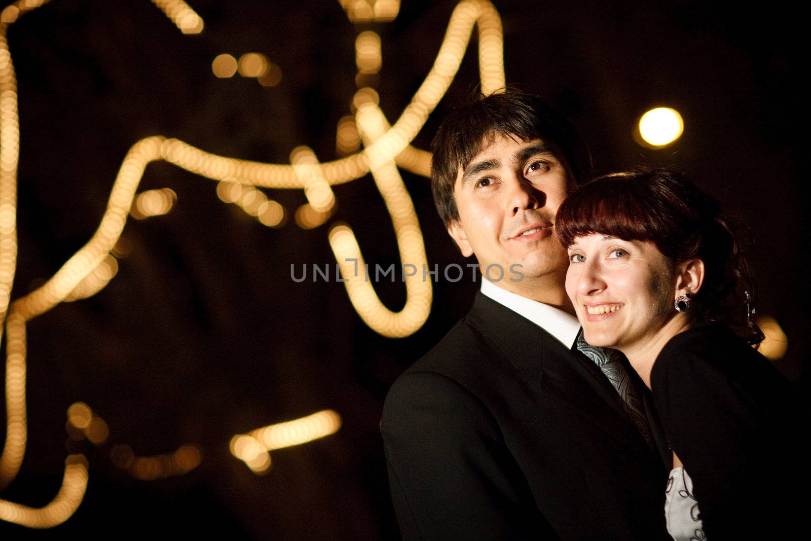 groom and bride at night