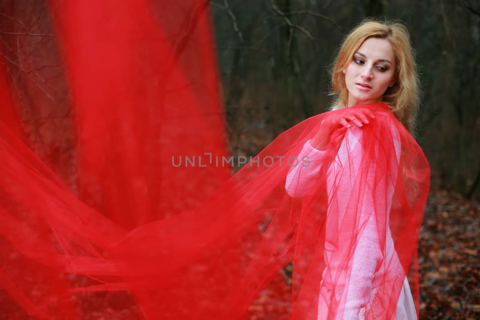 A beautiful young woman with a red shawl