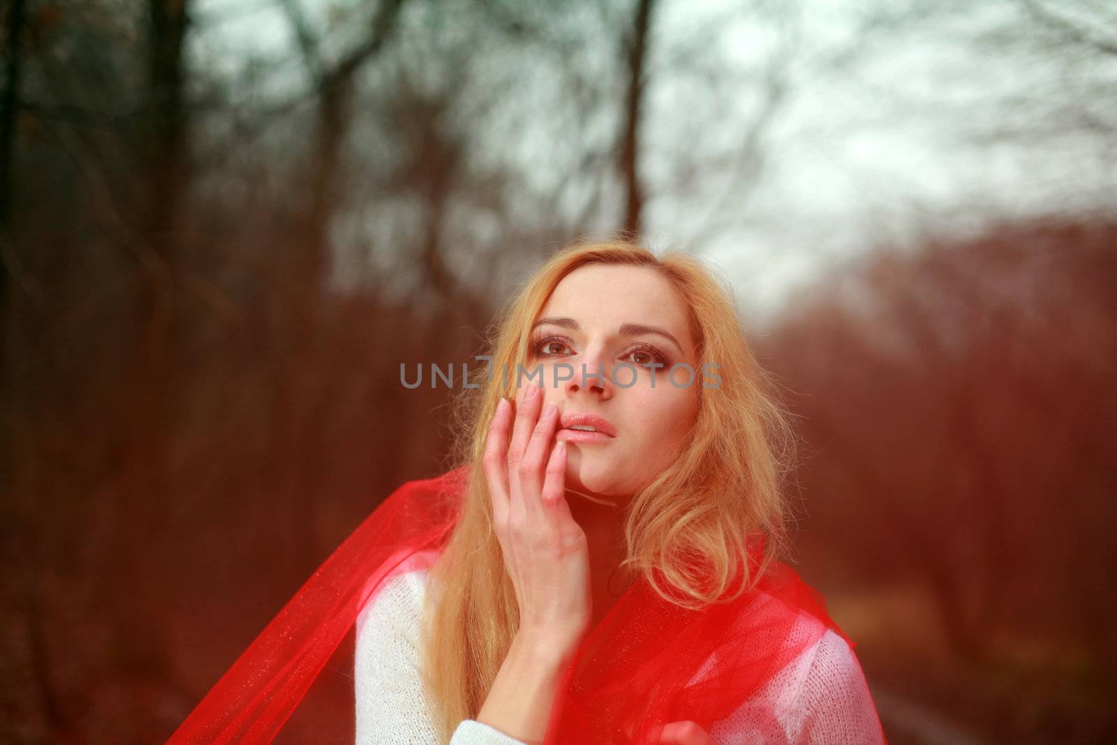 A beautiful woman with a red shawl