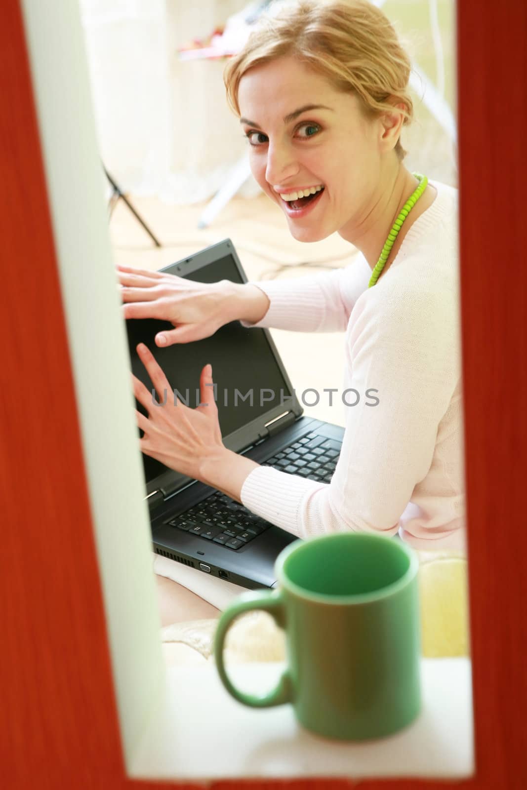An image of a girl with a laptop