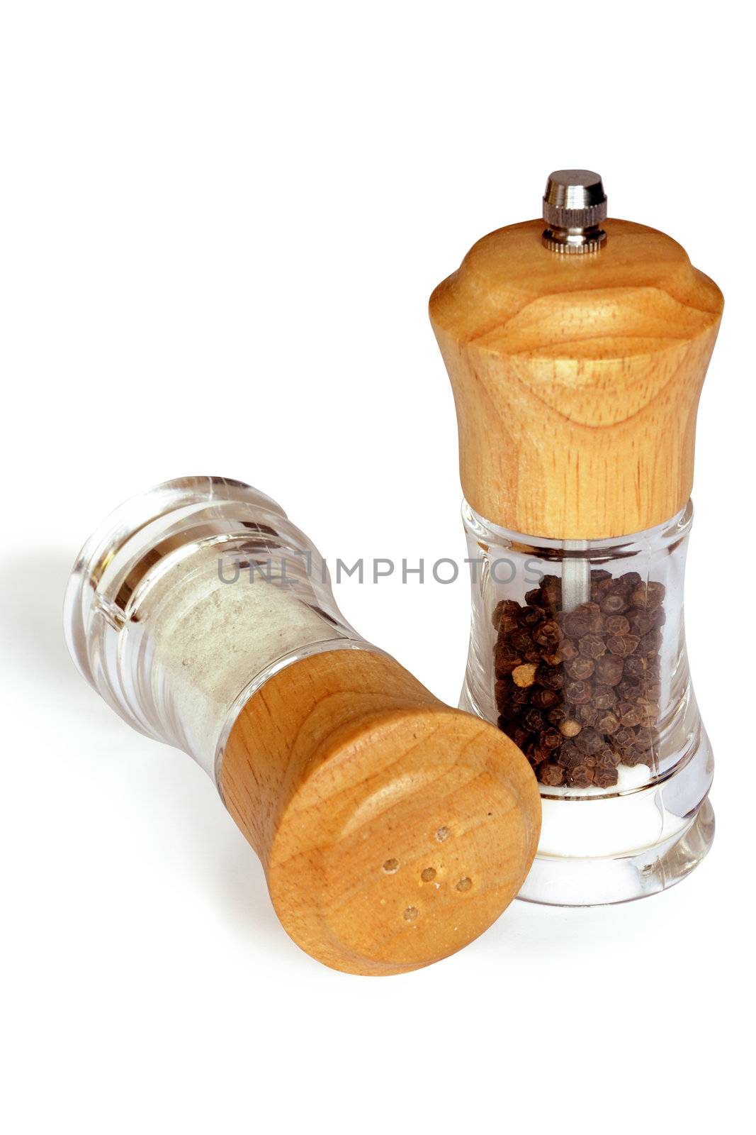 An image of two bottles of salt and pepper