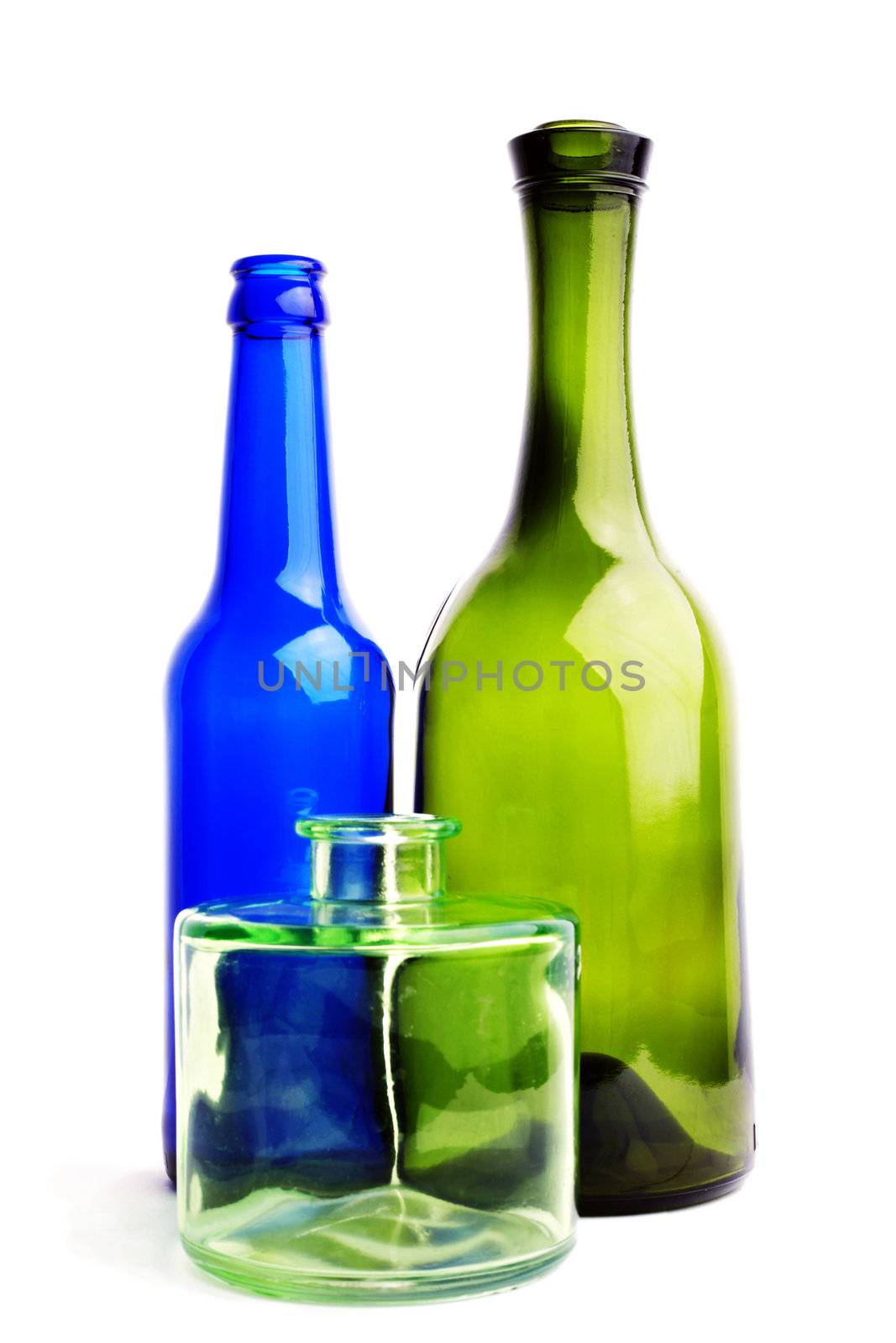 An image of three bottles. Isolated on white.