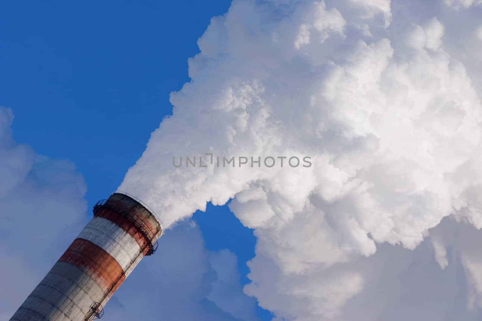 smoking pipe of factory, contaminating an environment on a background clean sky