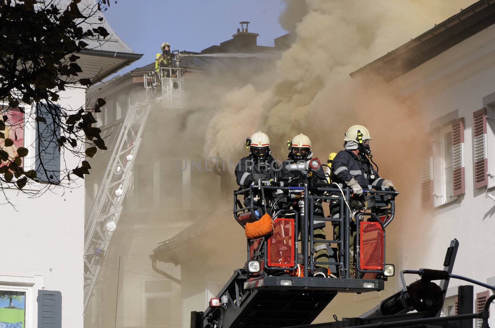 firefighter extinguish fire by fahrner