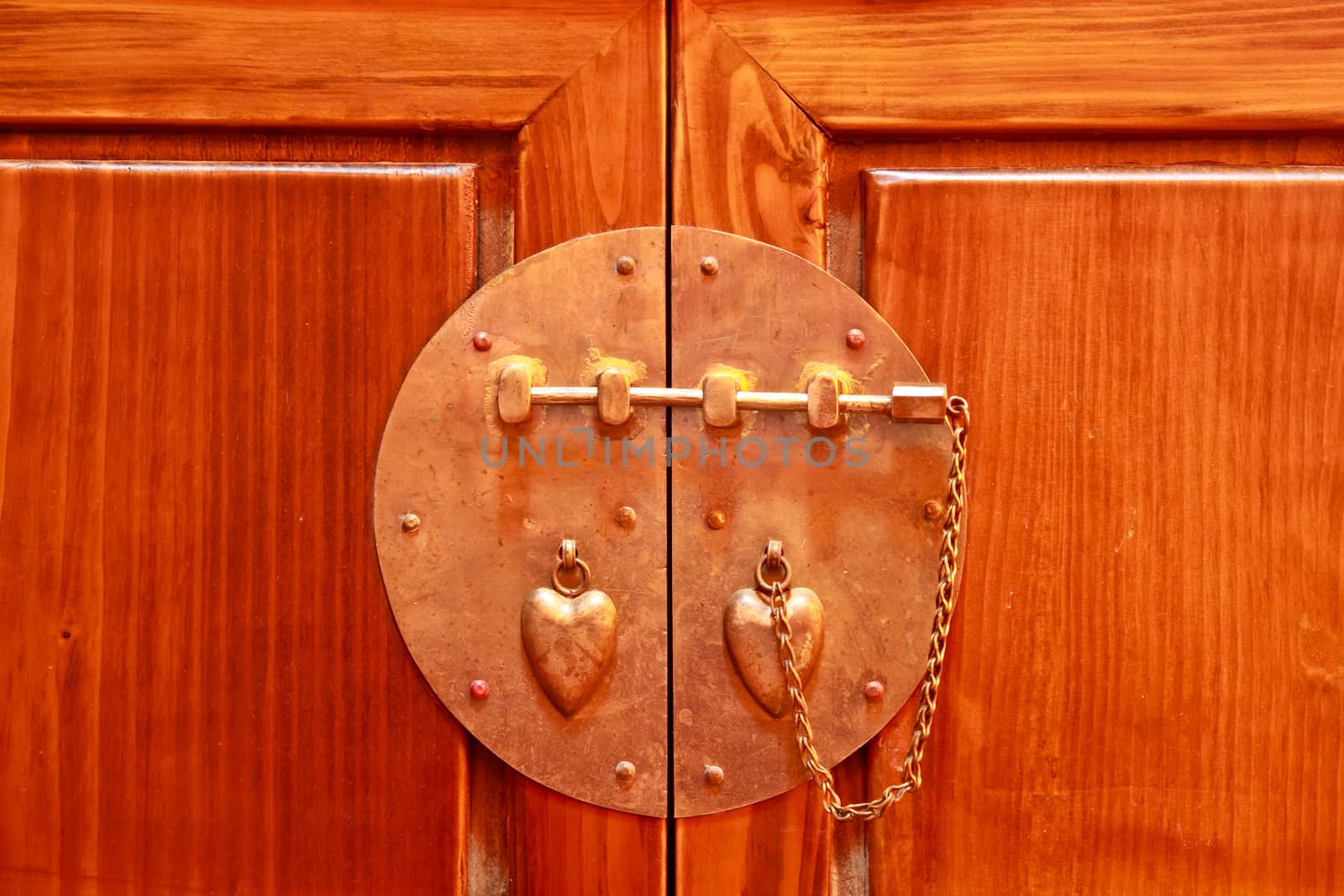 Traditional chinese old knocker on wood door