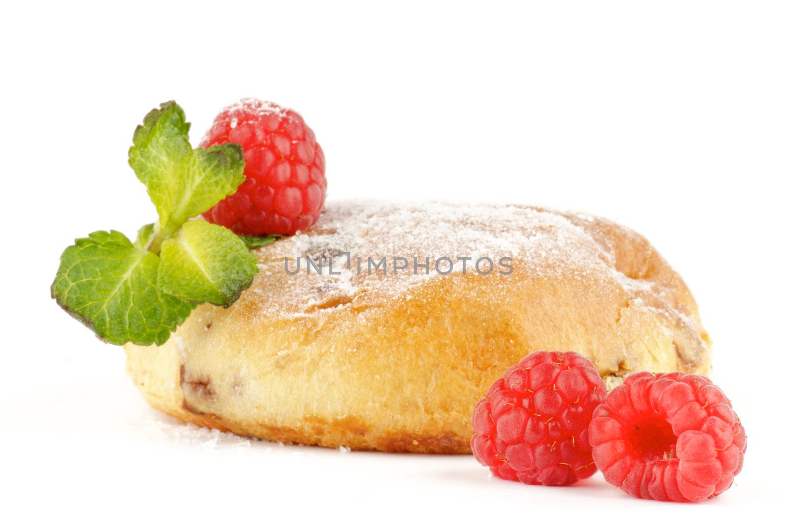 Appetizing baked cakes with raisin, raspberry and mint decorated sugar powder isolated on white background