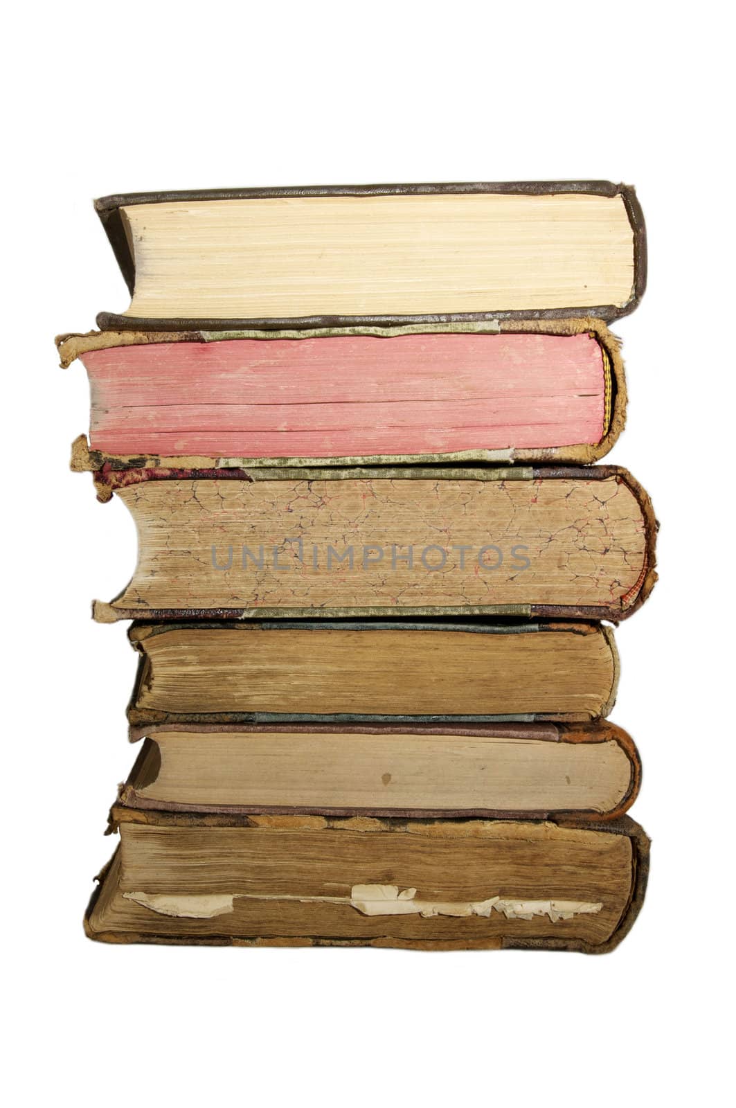 a few old books on a white background