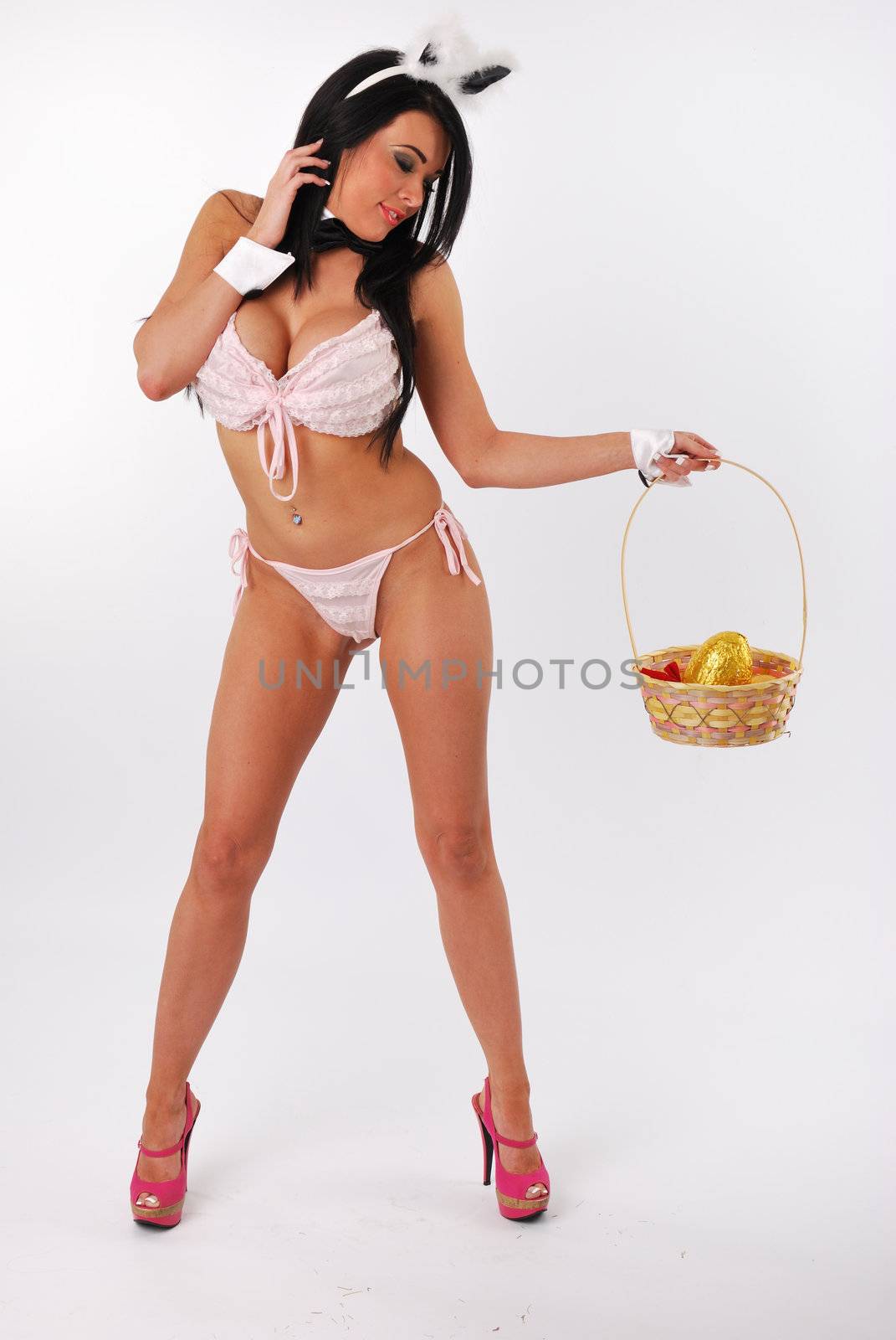 bunny girl standing with easter basket