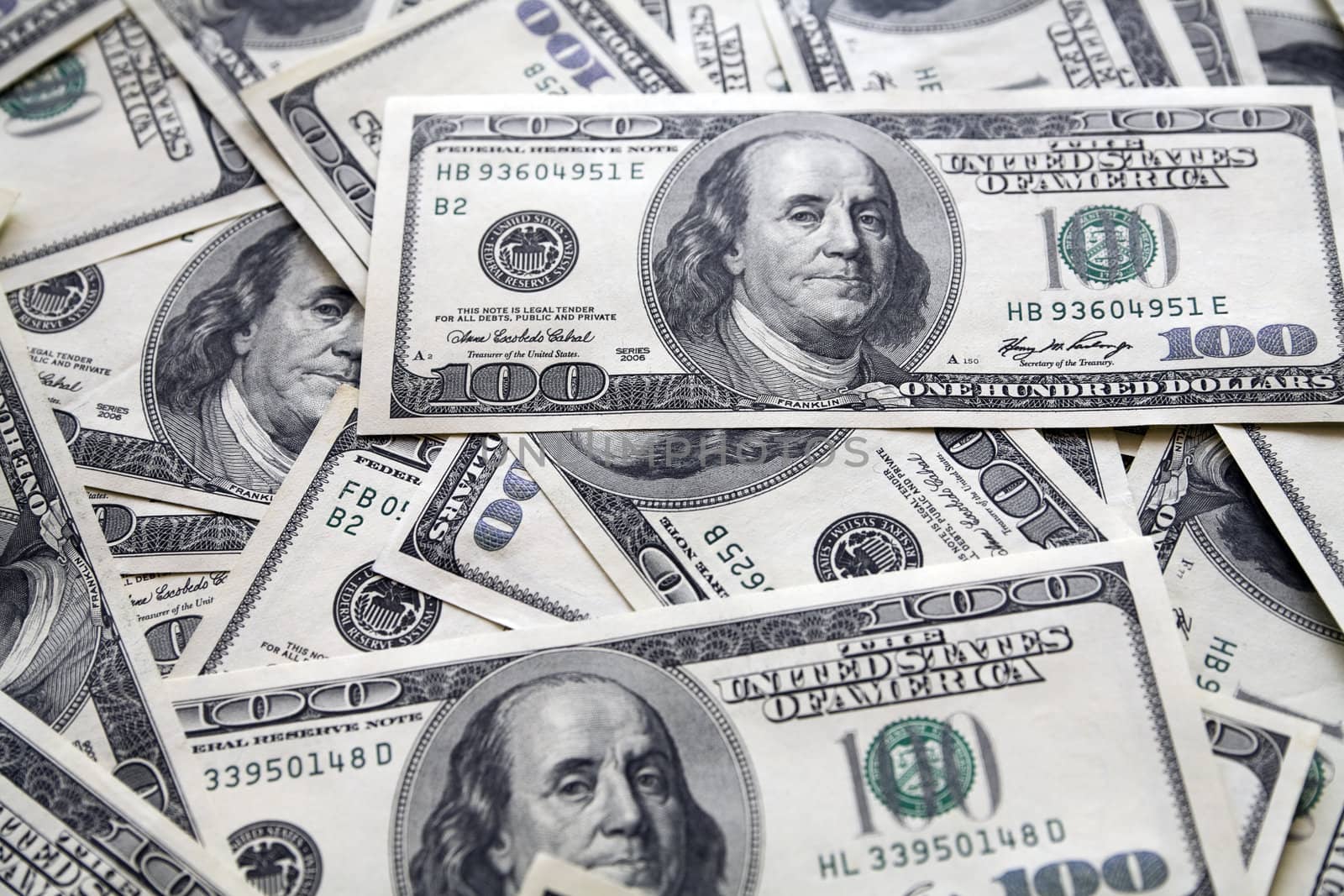 background from chaotically lyings one hundred greenbacks
