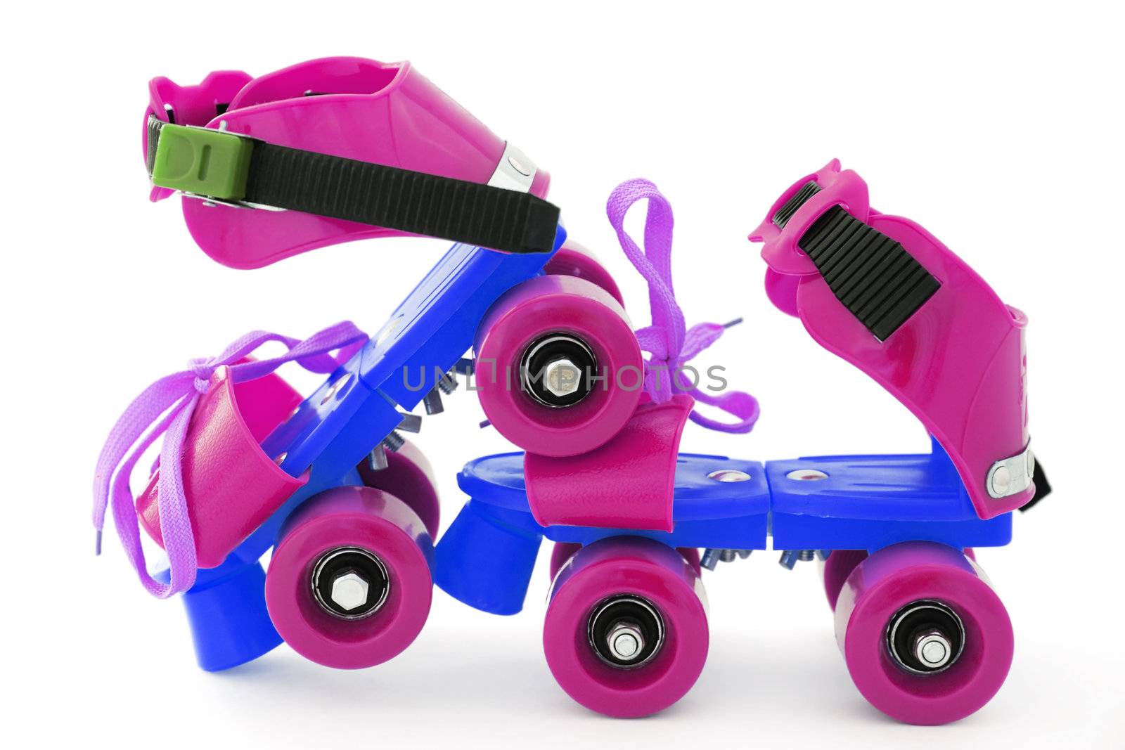 funny colored roller skates on white background