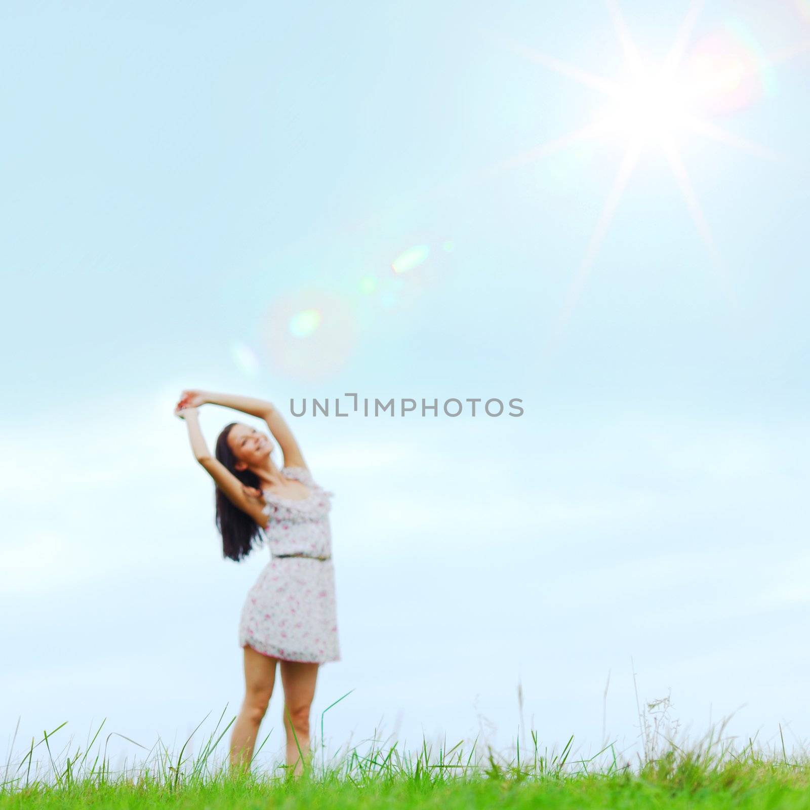 woman on green grass field by Yellowj