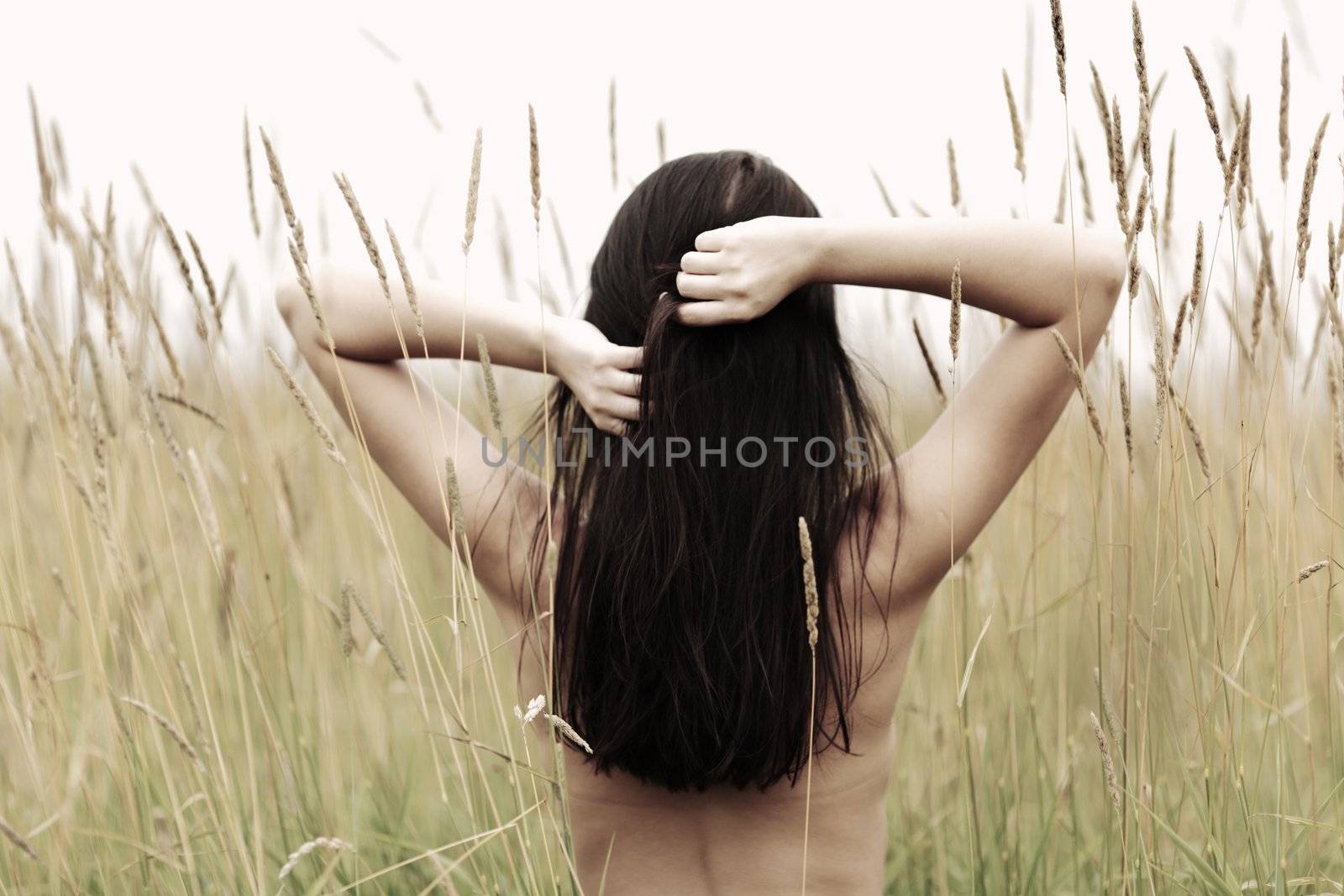woman on grass field feel freedom