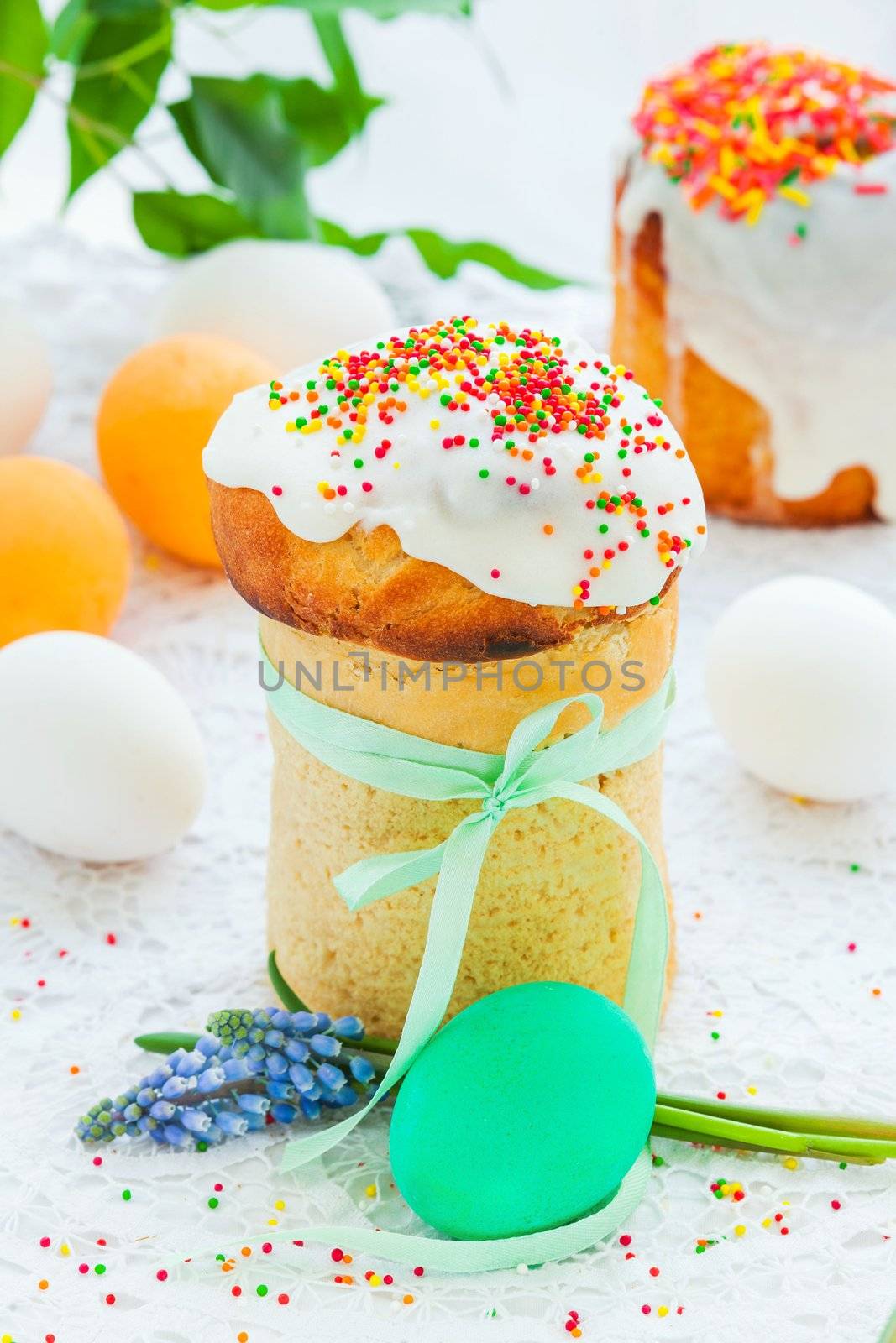 Easter cake and colorful eggs on festive Easter table