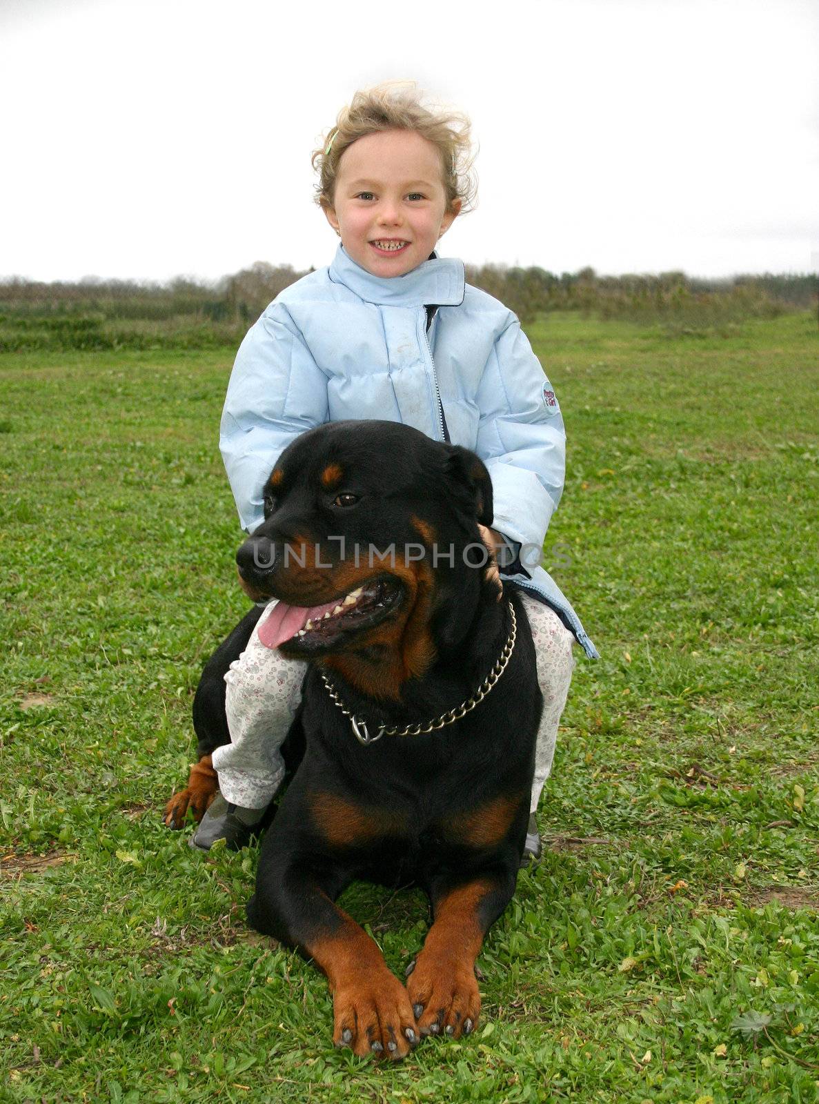 rottweiler and little girl by cynoclub