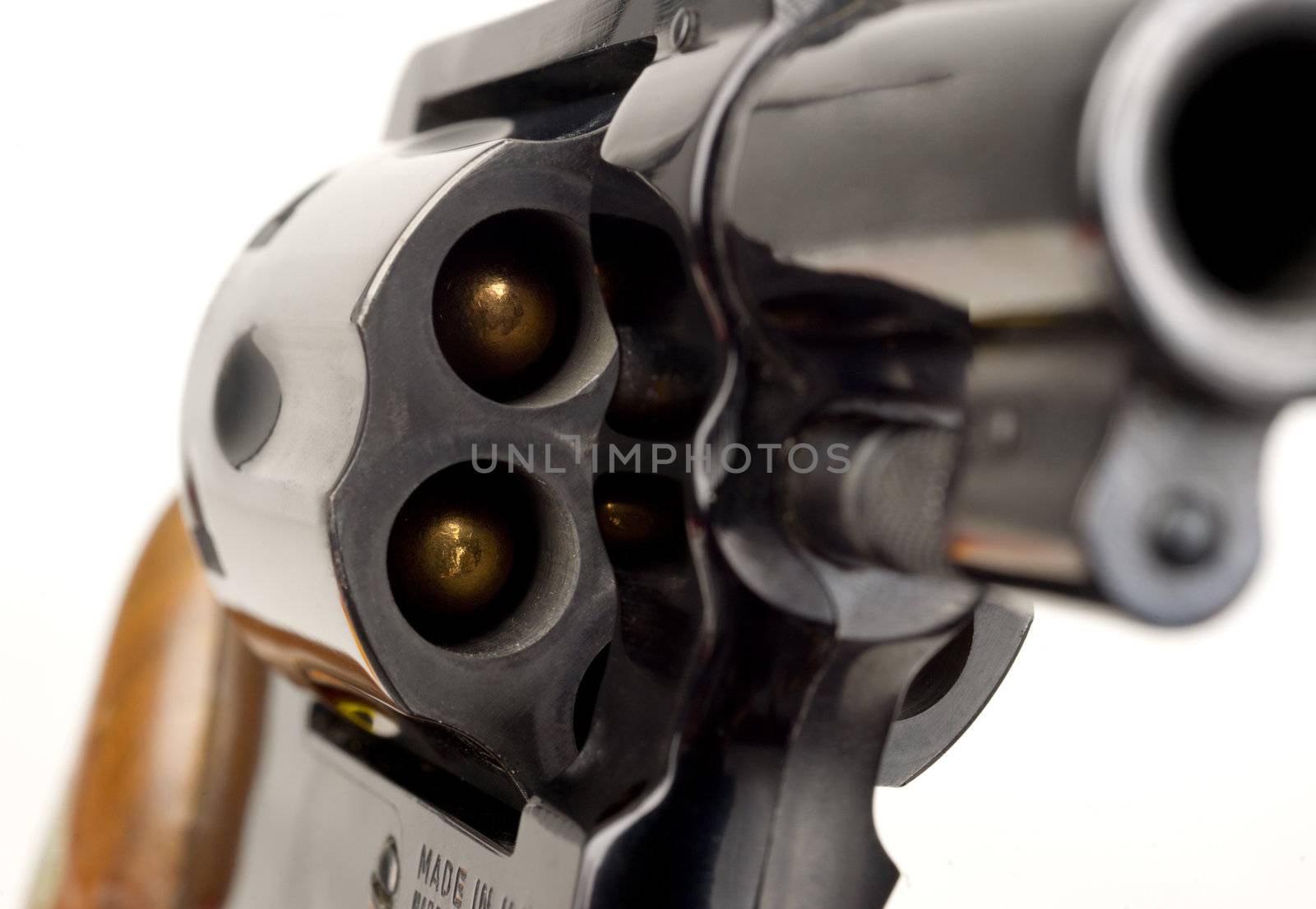 38 Caliber Revolver Pistol Loaded Cylinder Gun Barrel Close Up Pointed on White