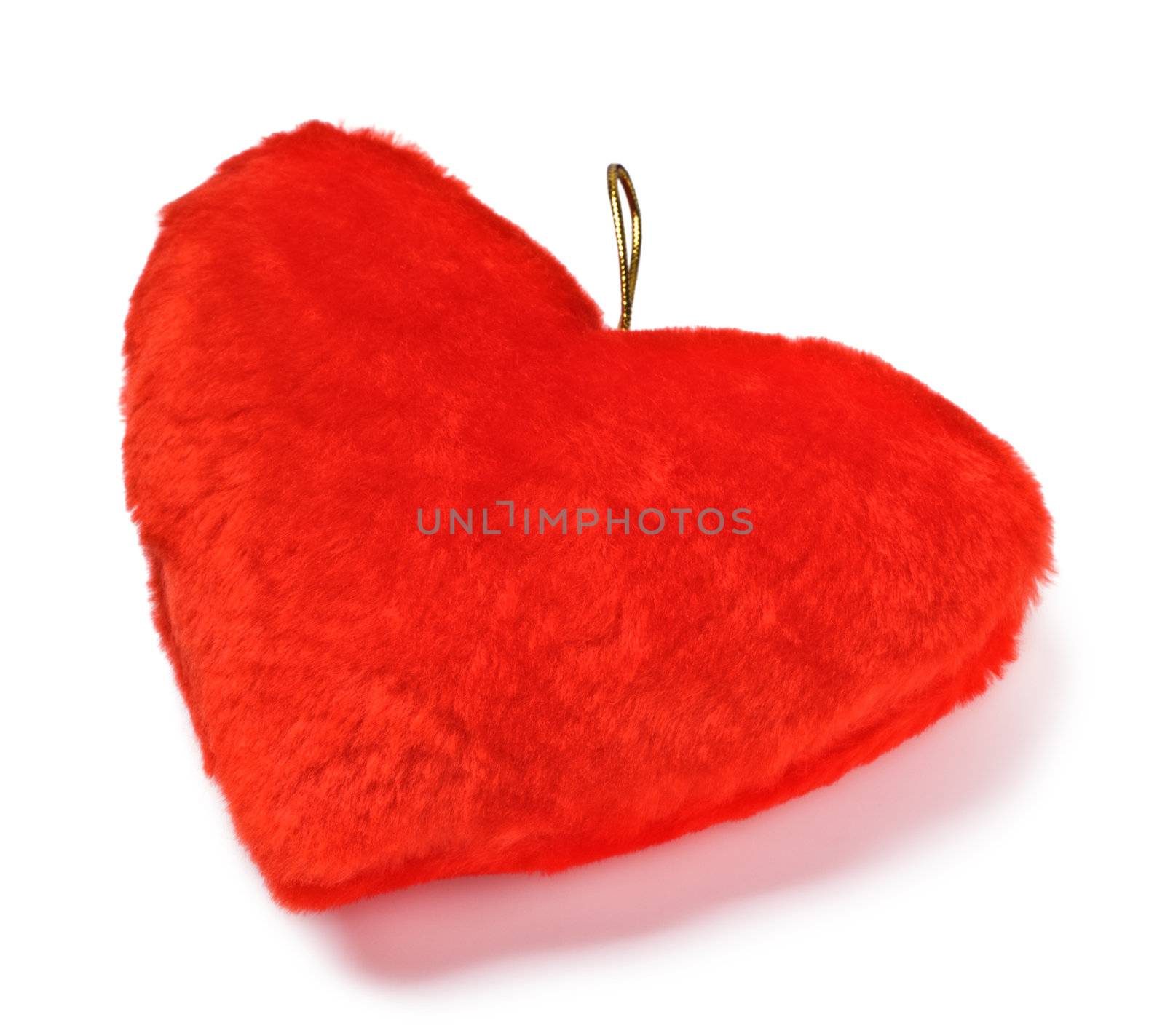 red heart shaped pillow by petr_malyshev