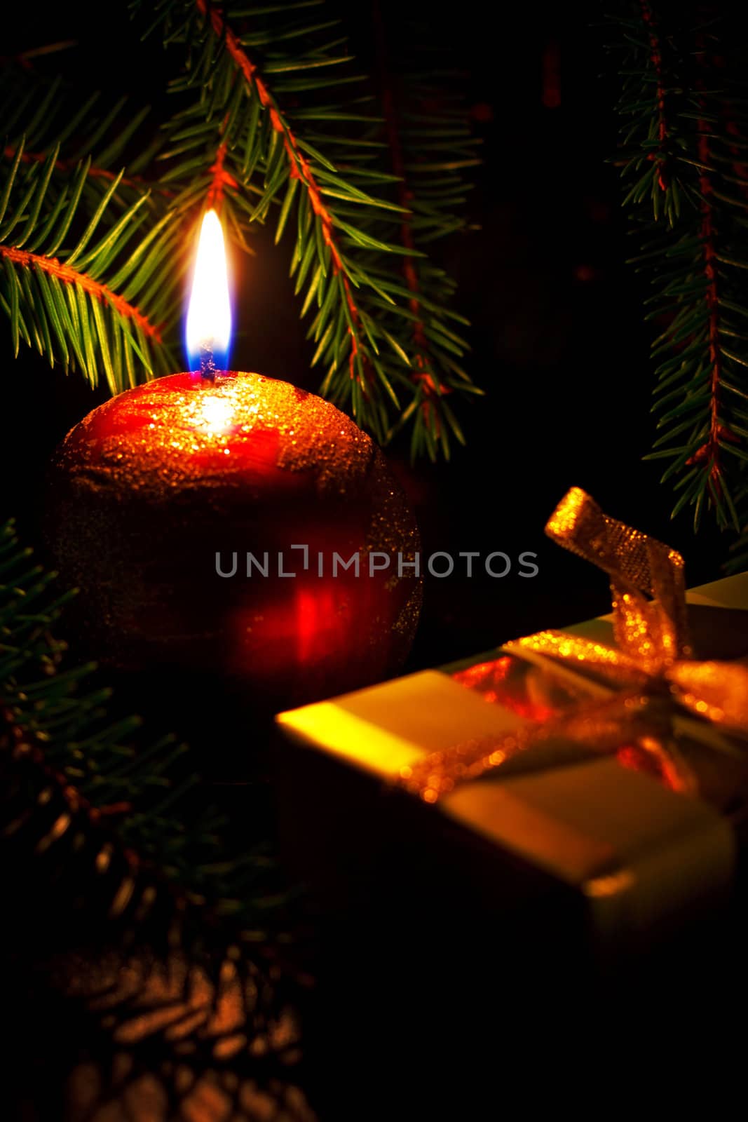 christmas card with candle and gift box